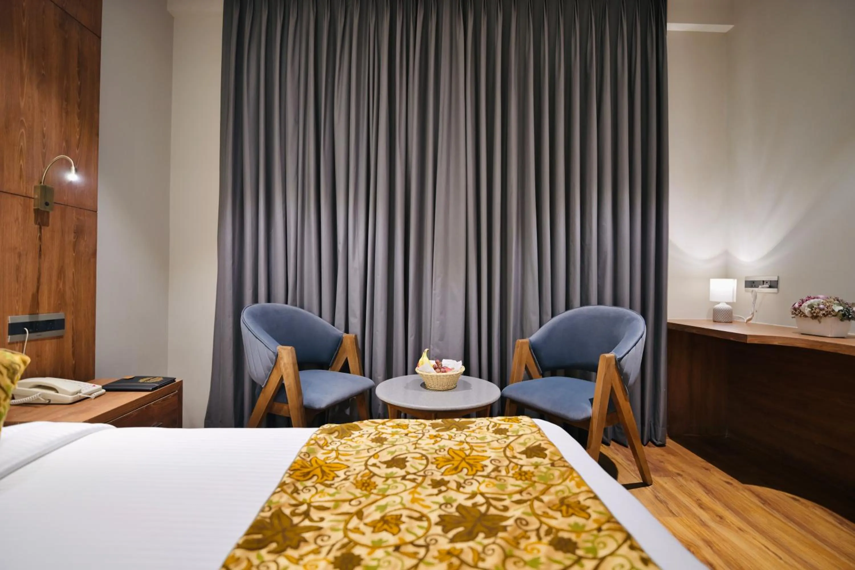 Seating area, Bed in The Olive Hotel Srinagar