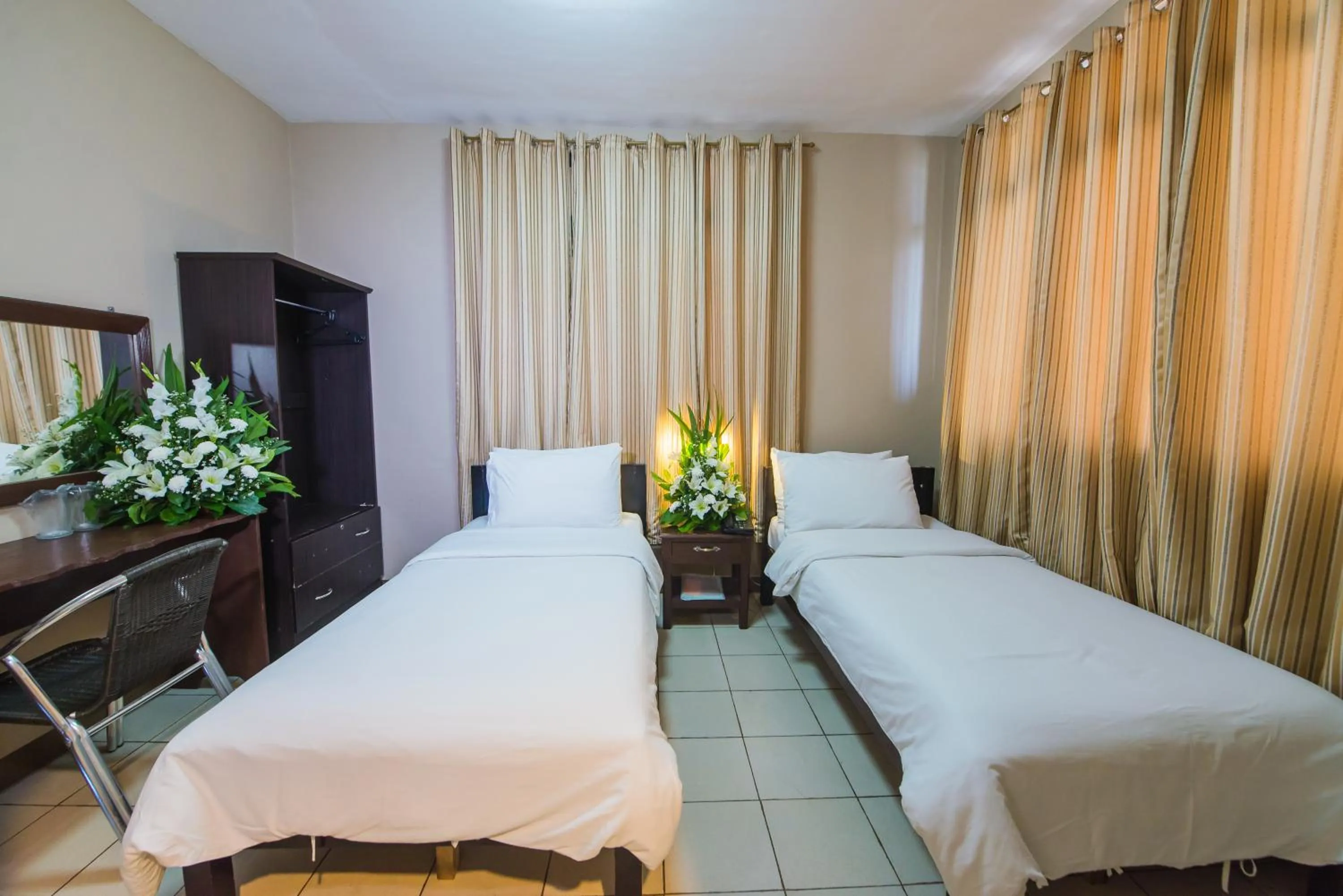 Bed in Northland Resort Hotel Manapla