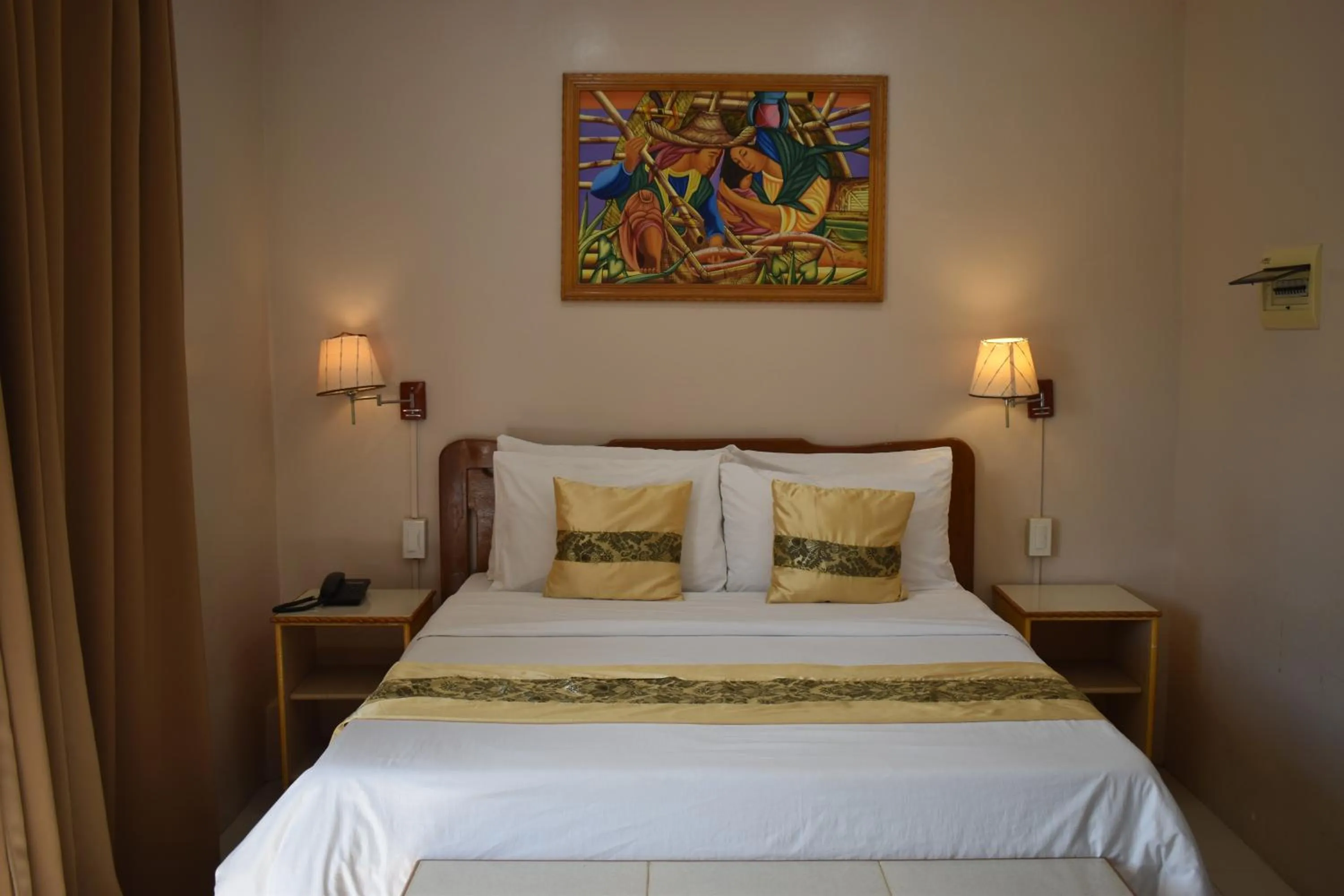 Bed in Northland Resort Hotel Manapla