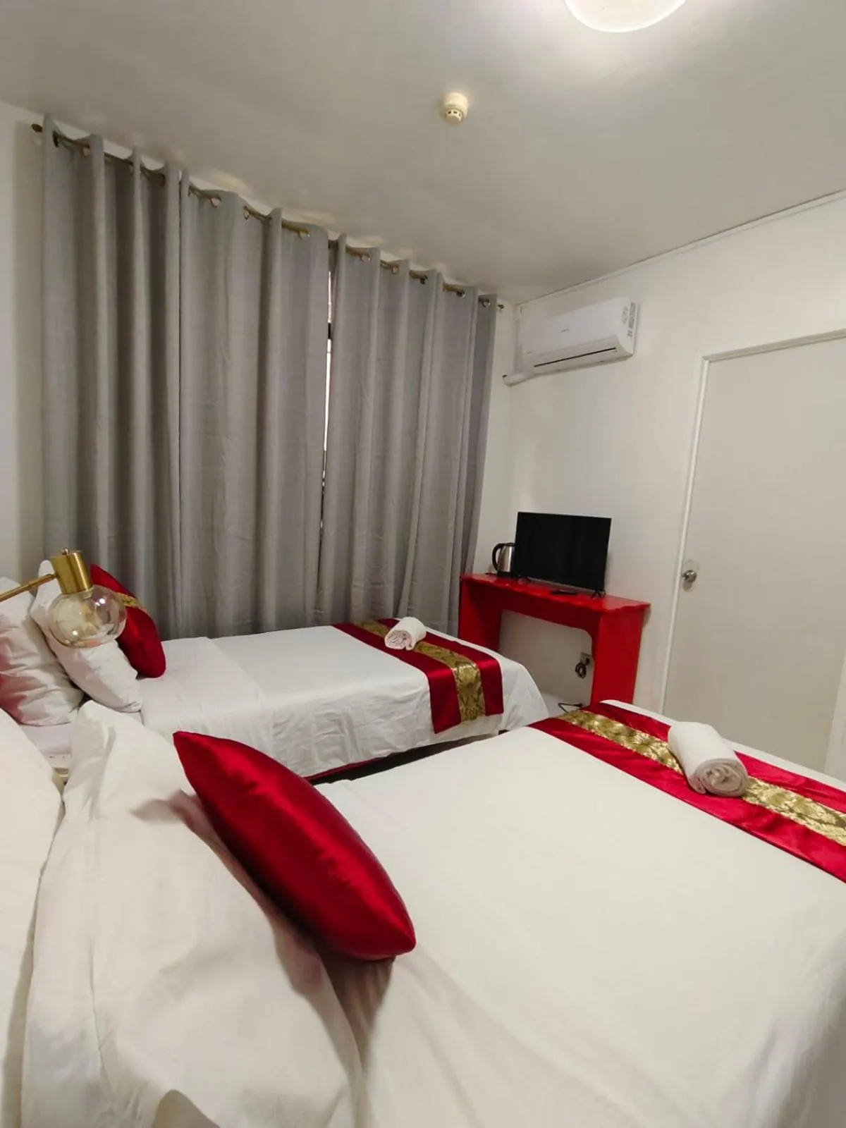 Bed in Northland Resort Hotel Manapla