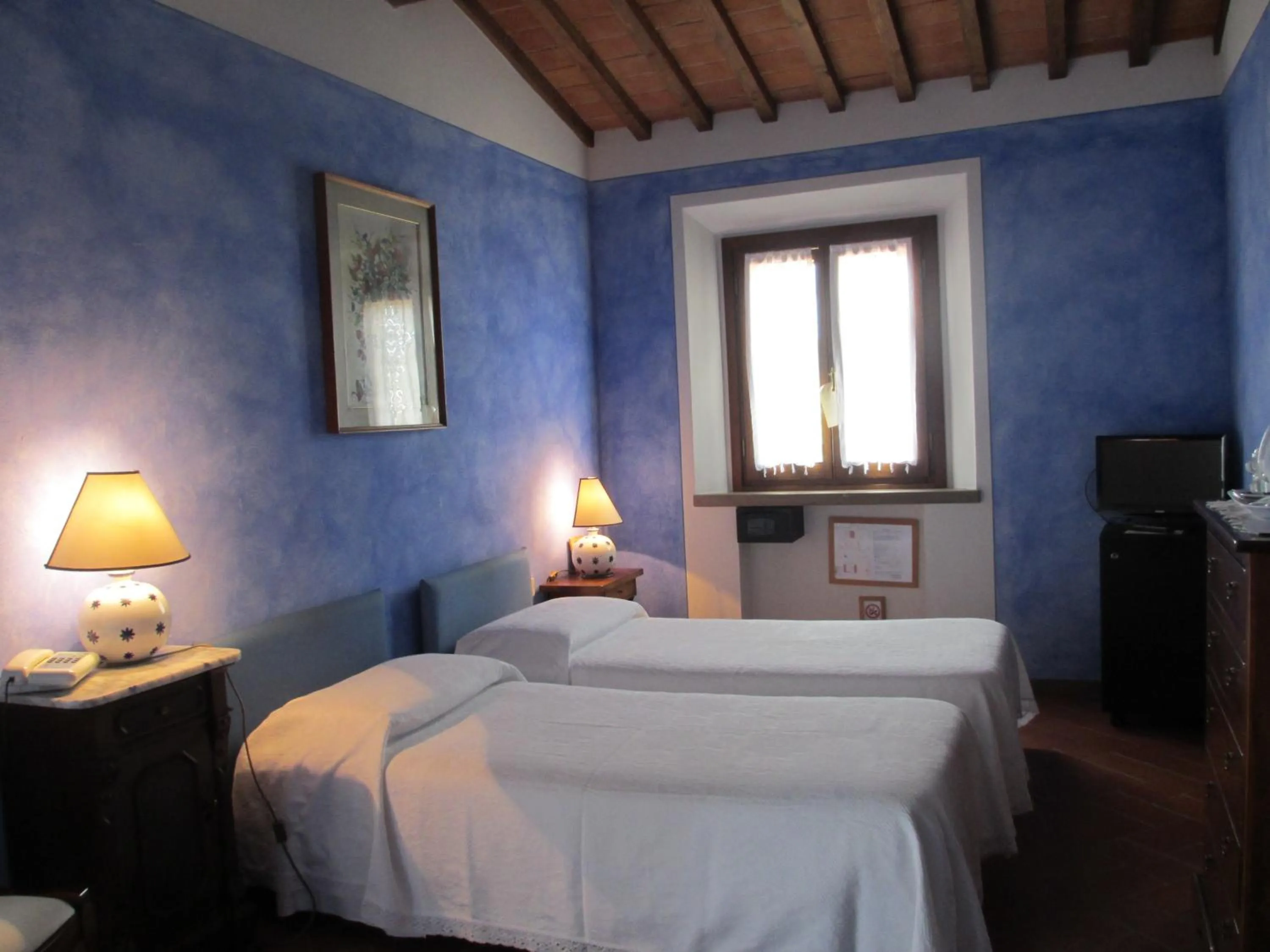 Photo of the whole room in Locanda le Boscarecce