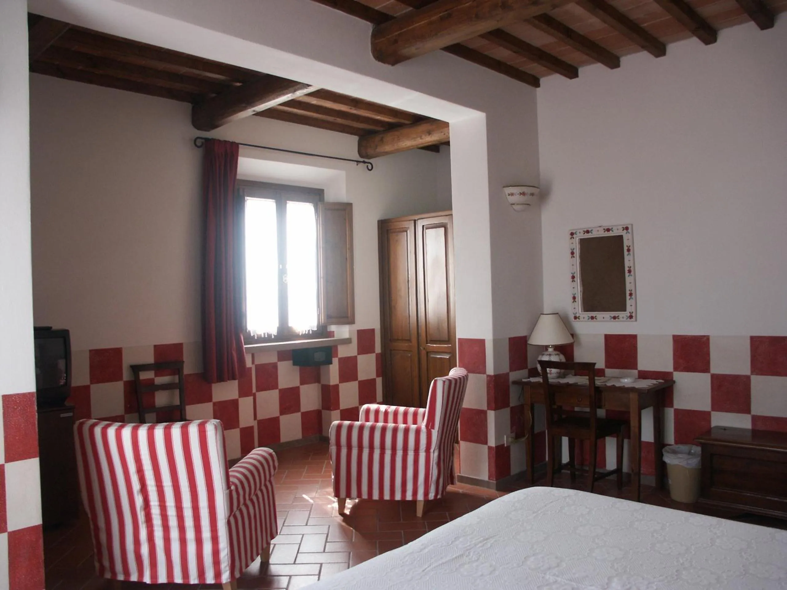 Photo of the whole room in Locanda le Boscarecce