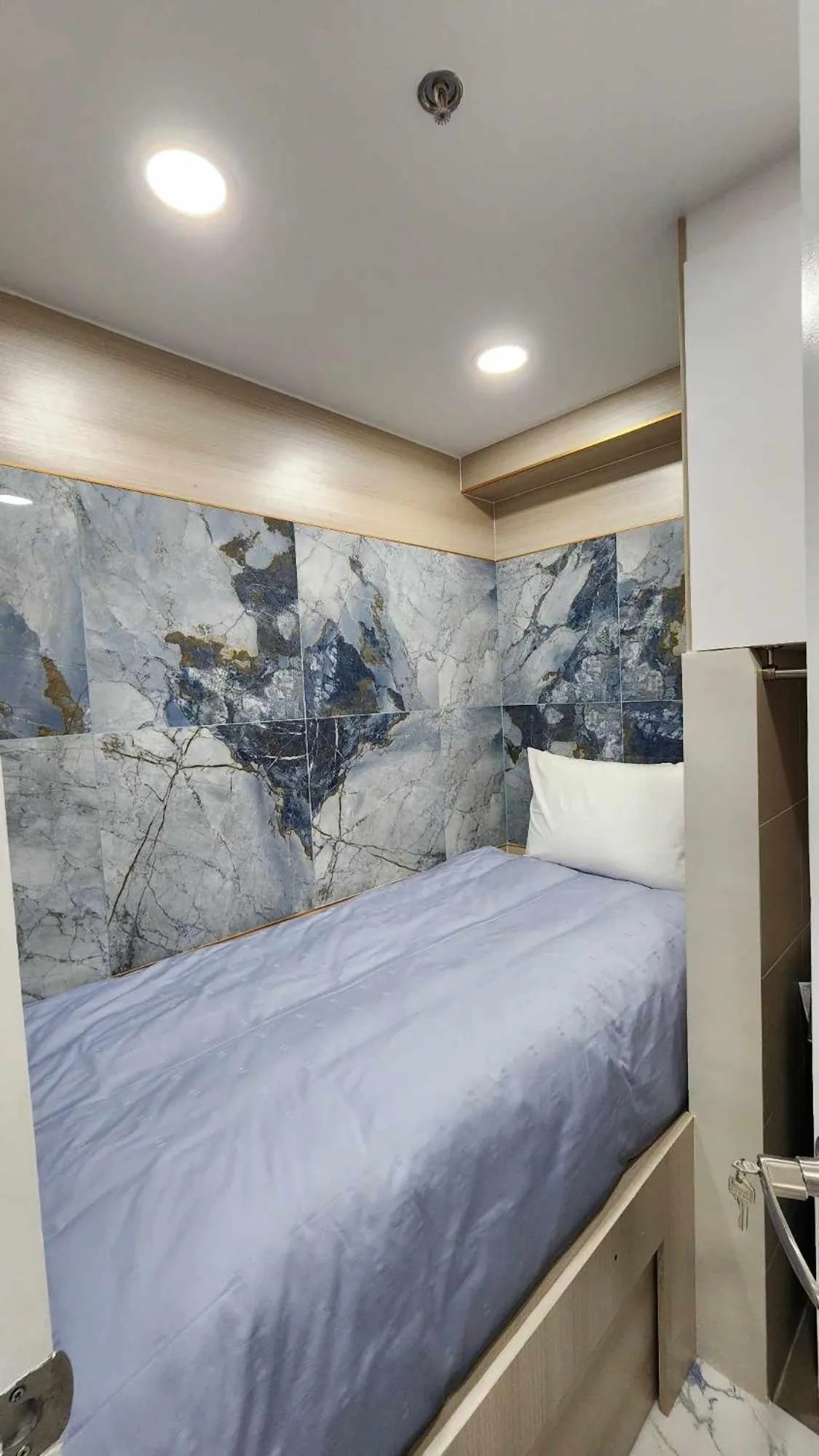 Bed in SMDC Coast Residences