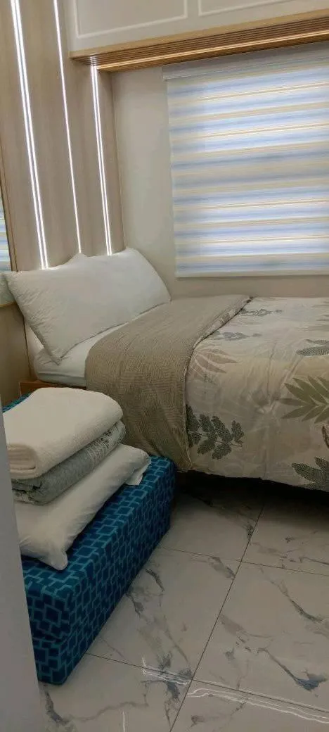 Bed in SMDC Coast Residences