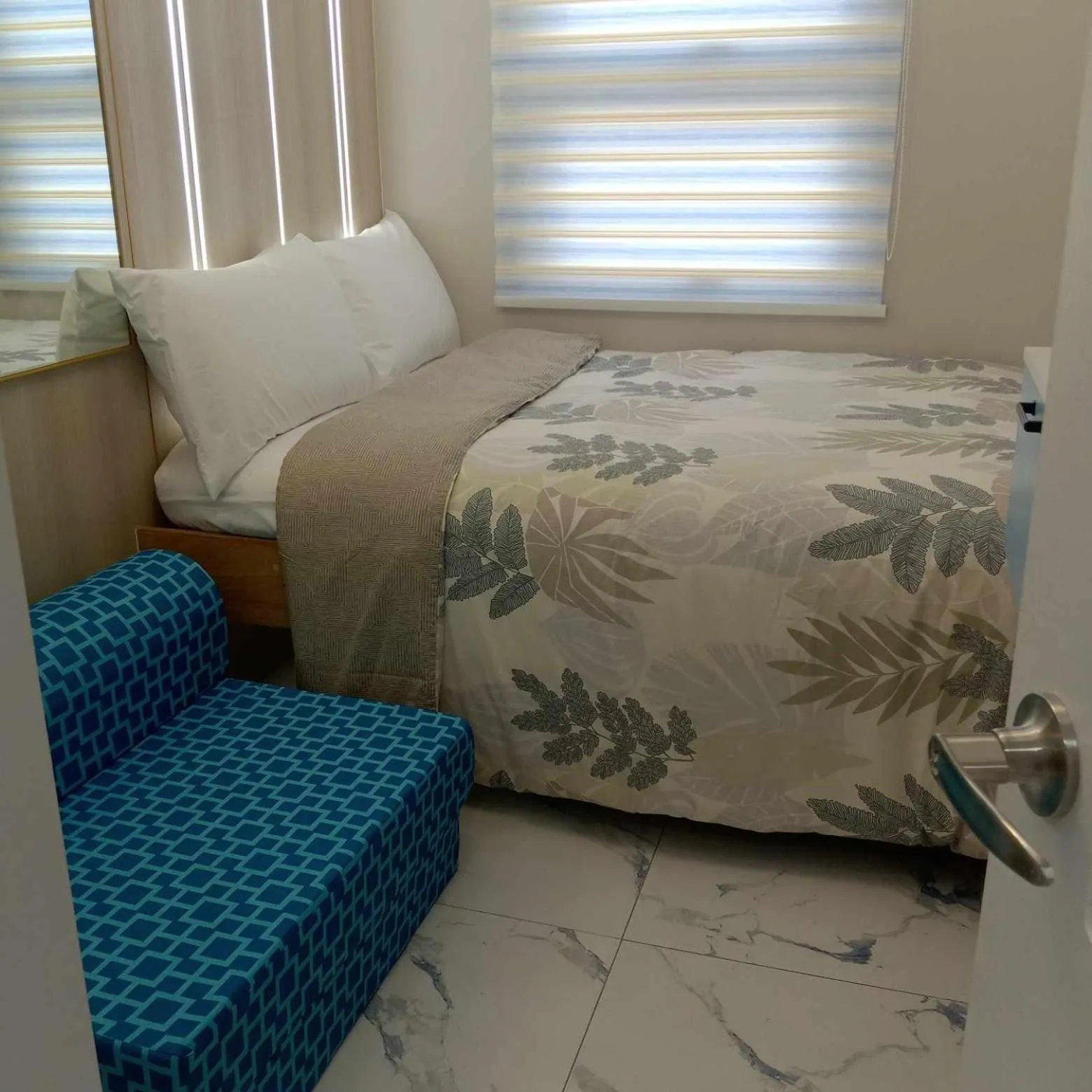 Bed in SMDC Coast Residences