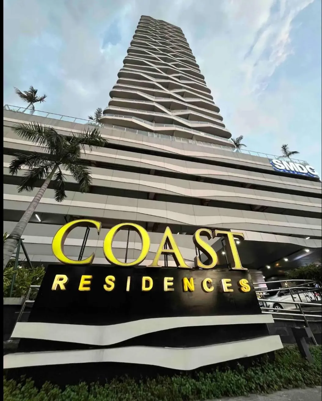 Property logo or sign in SMDC Coast Residences