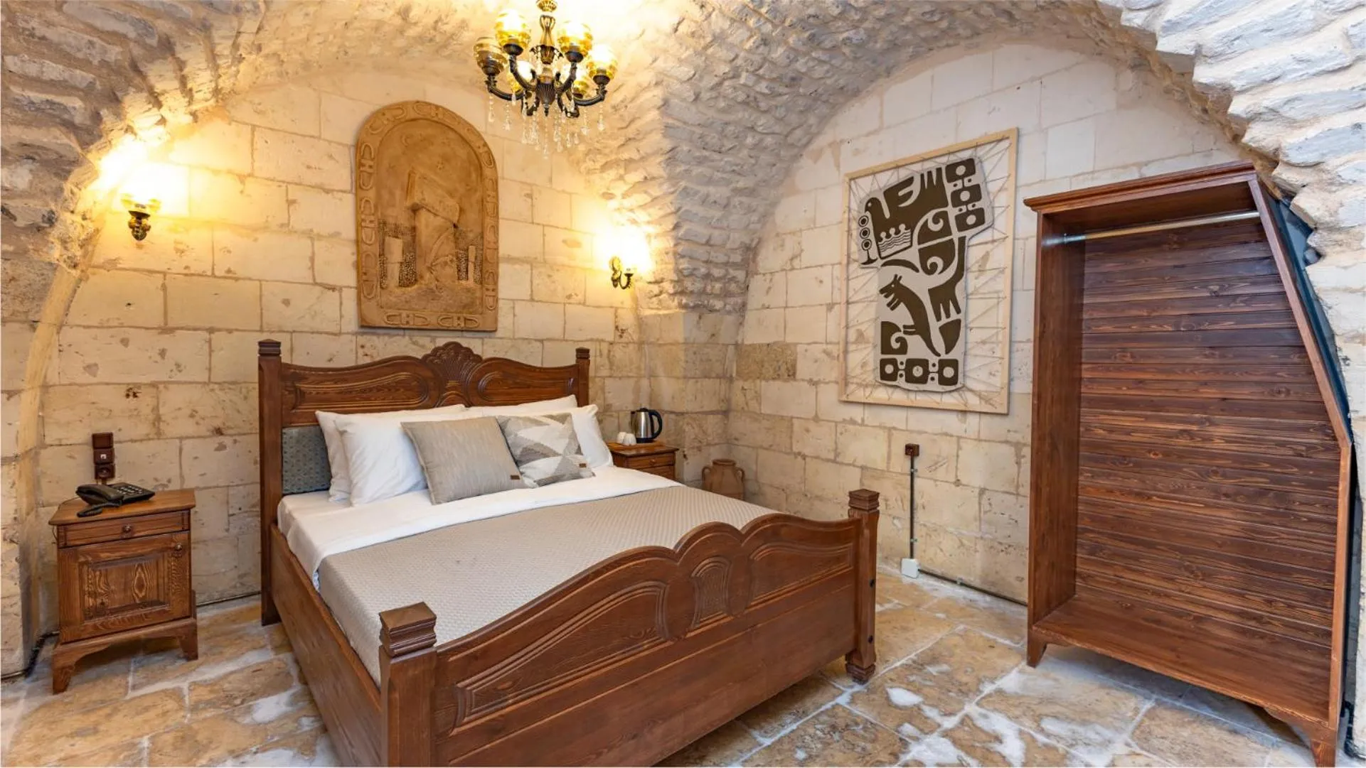 Bed in Stone House by Cevahir