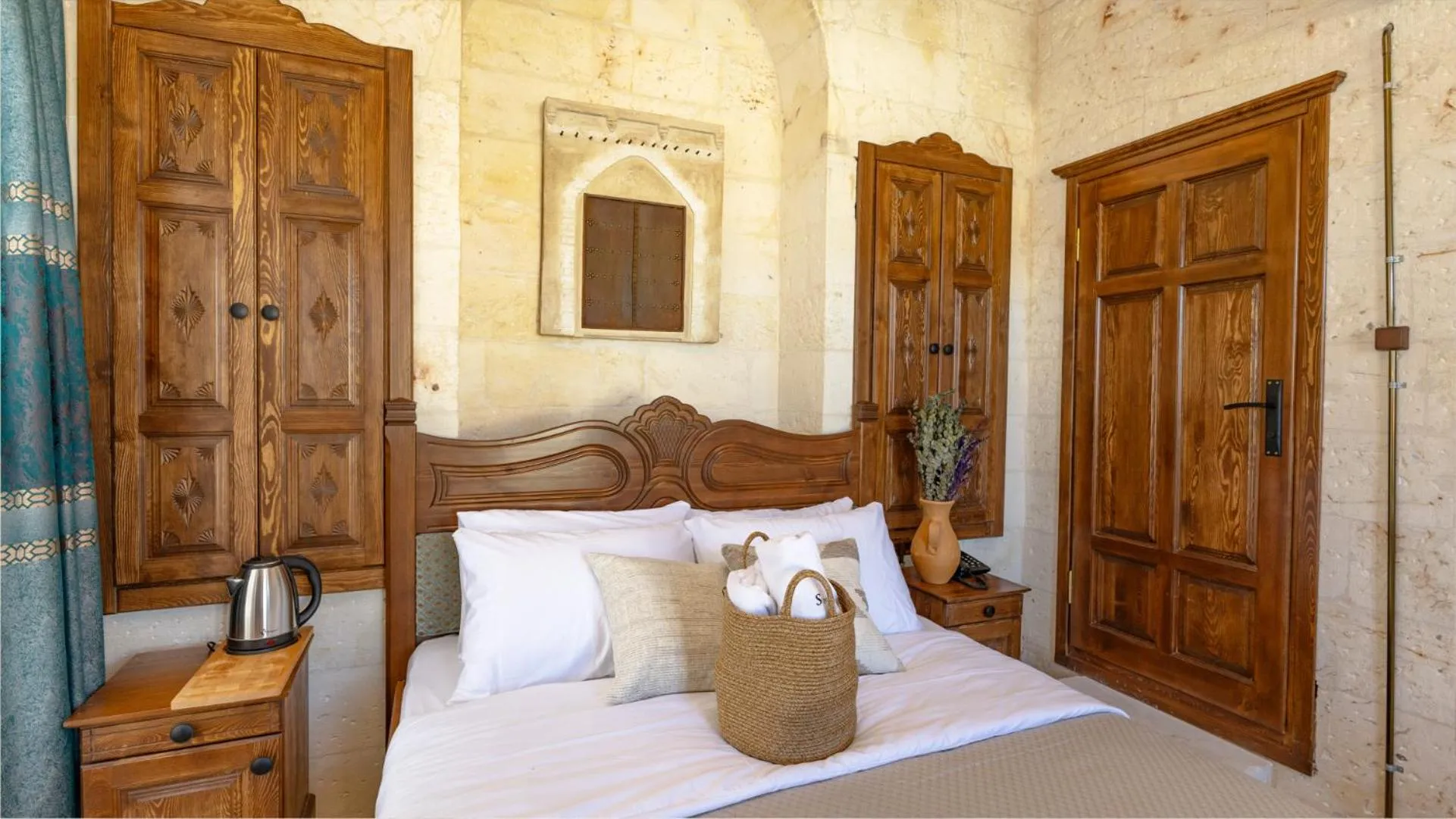 Bed in Stone House by Cevahir