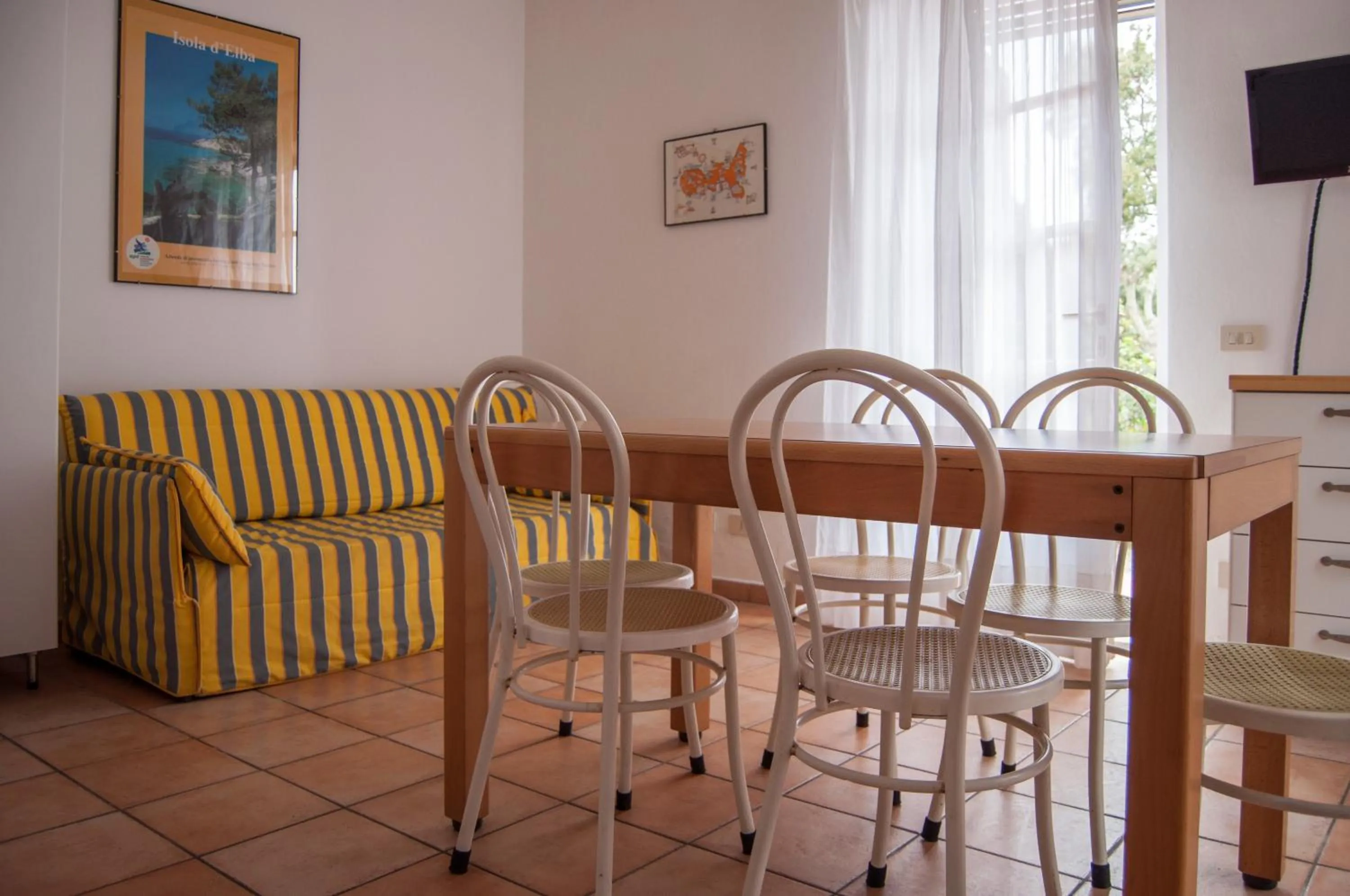 Dining area in Residence Le Mimose