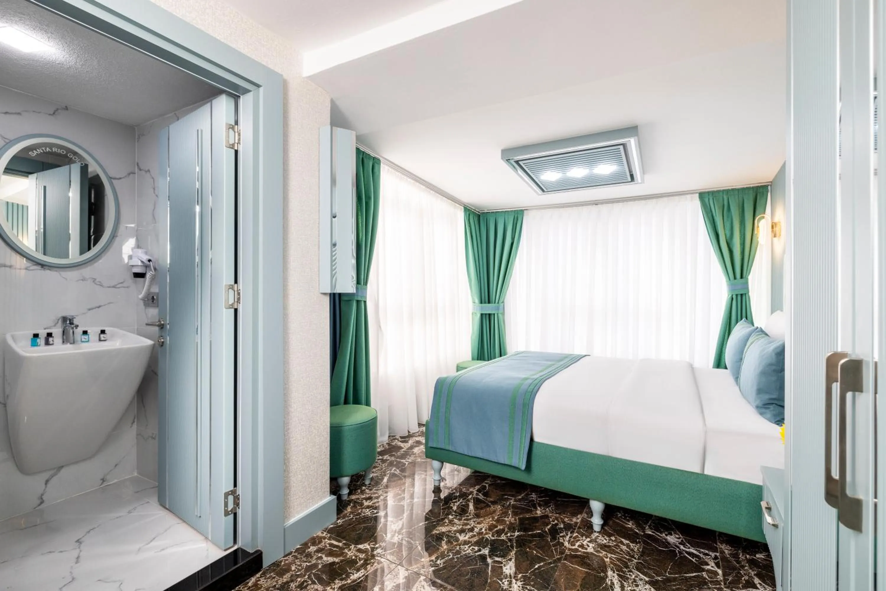 Bed in Santa Rio Gold Taxim Hotel