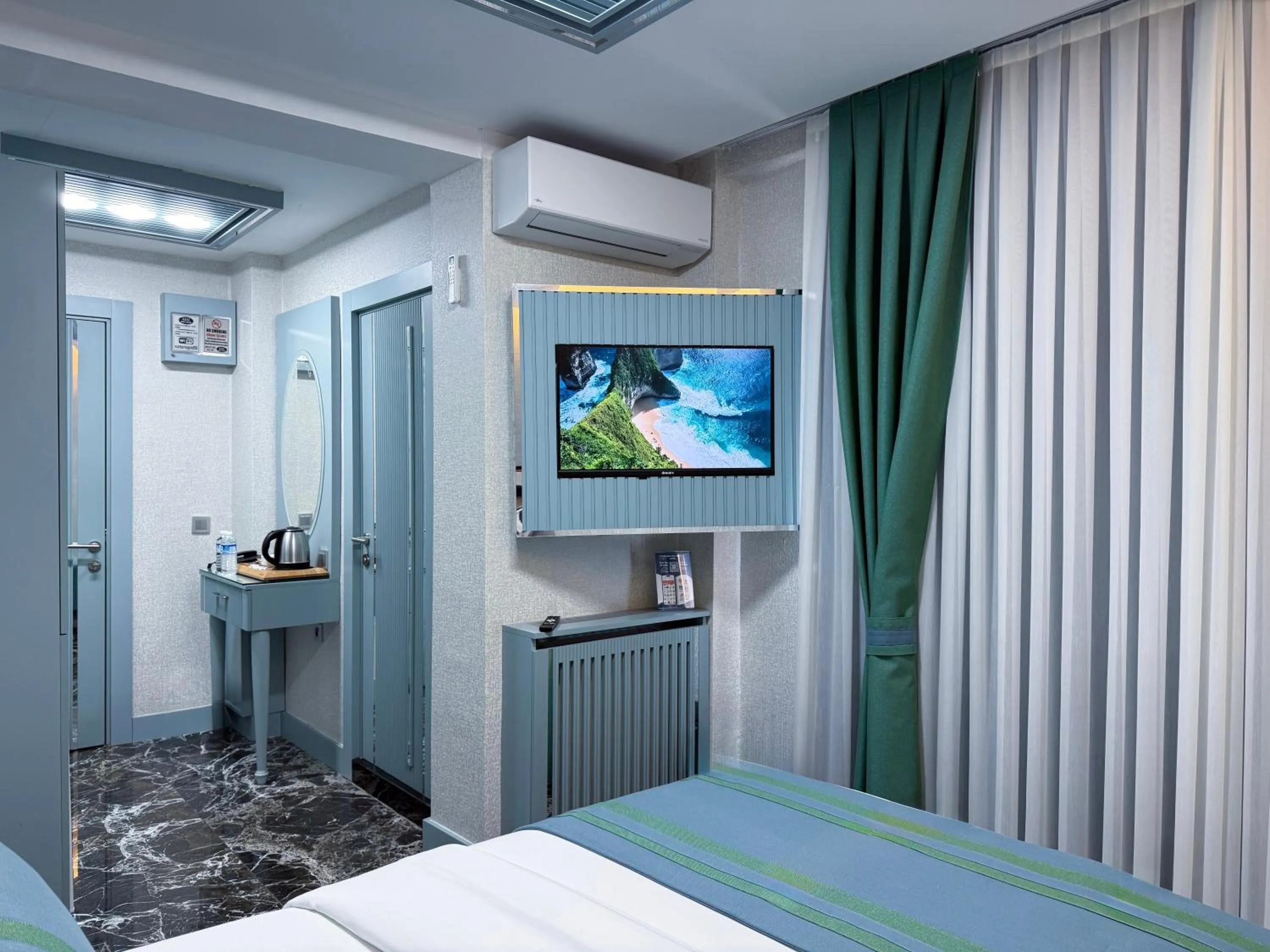 Bed in Santa Rio Gold Taxim Hotel