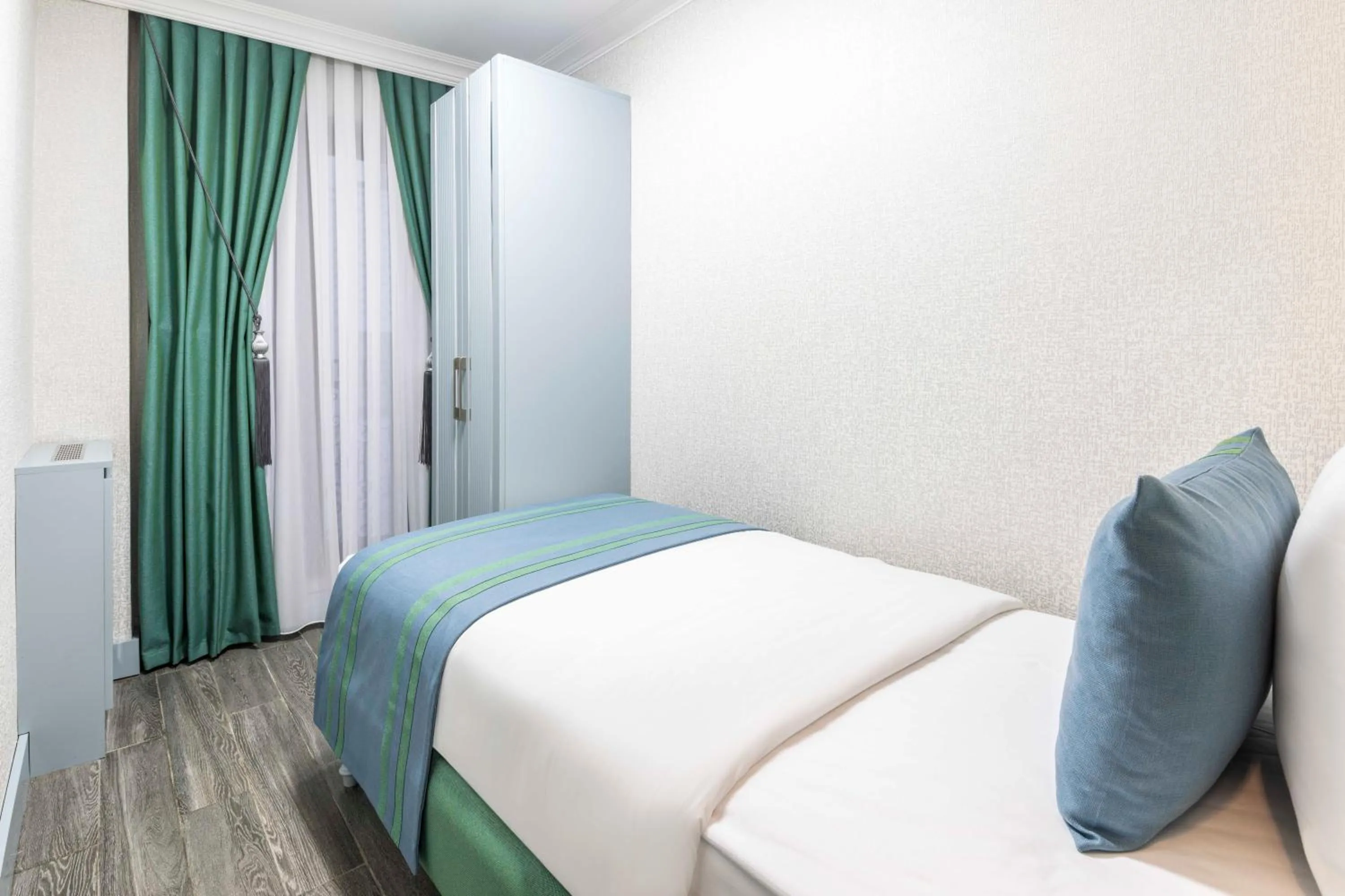 Bedroom, Bed in Santa Rio Gold Taxim Hotel