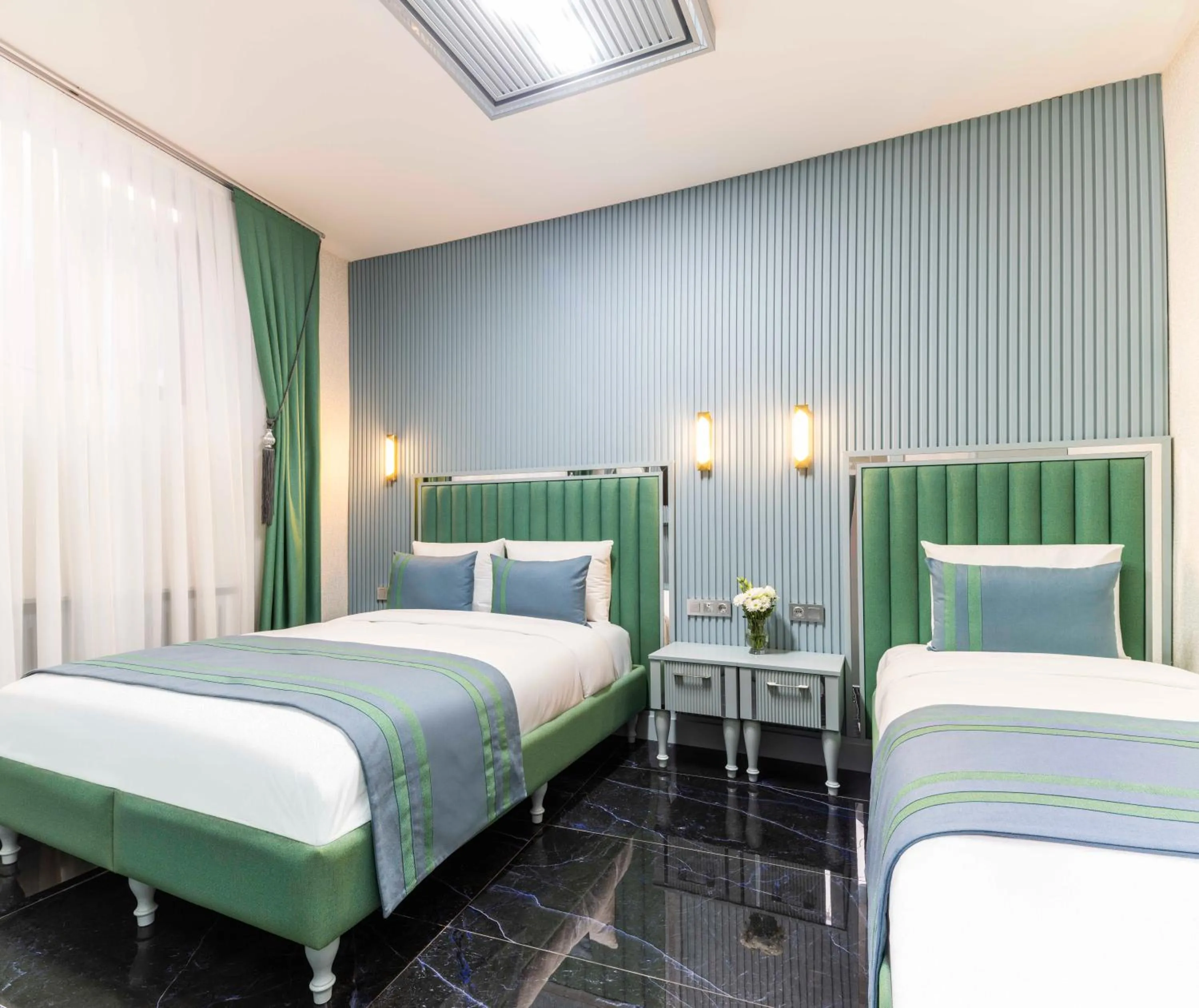 Bed in Santa Rio Gold Taxim Hotel