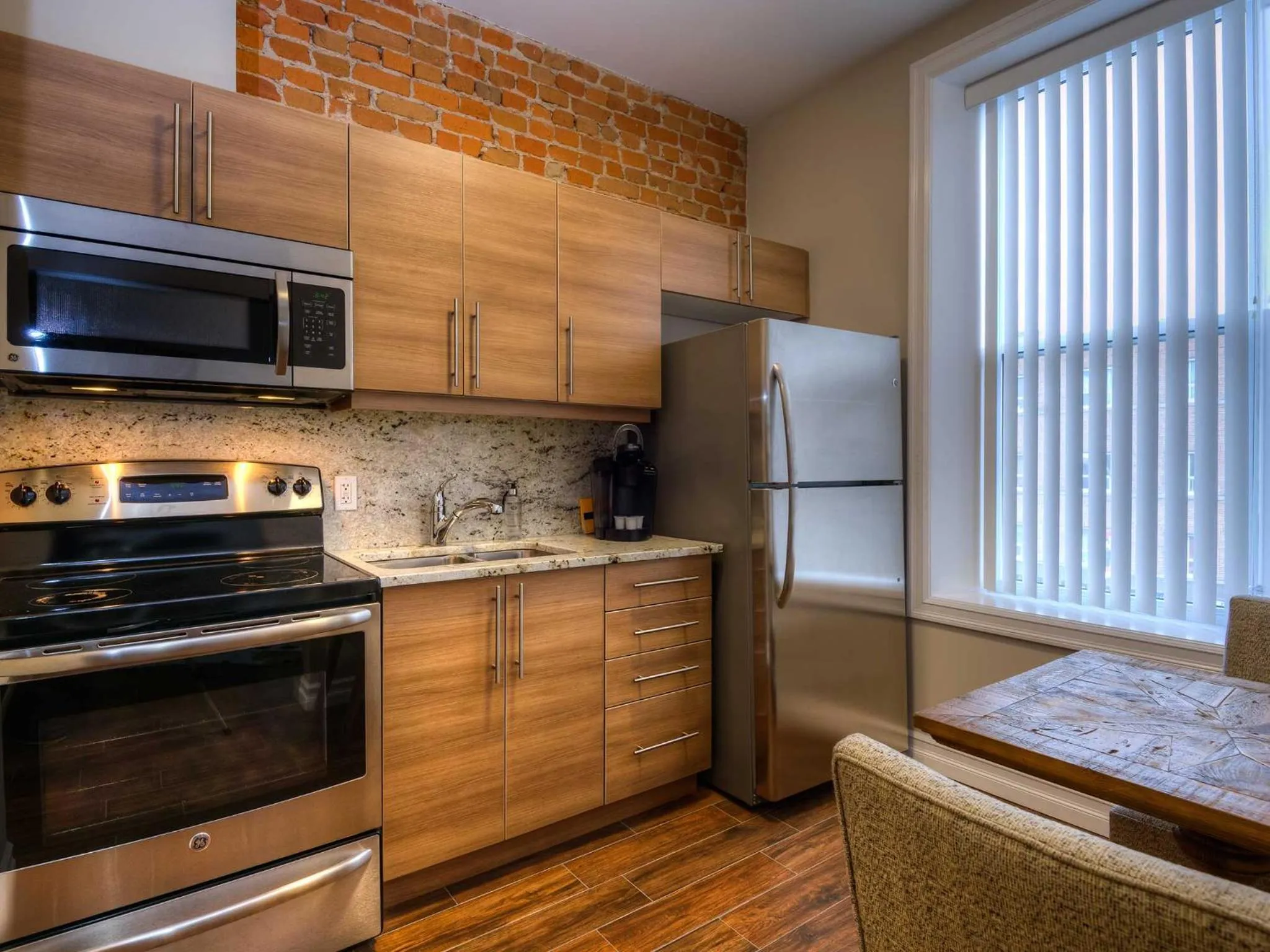 Kitchen or kitchenette in Western Hotel & Executive Suites