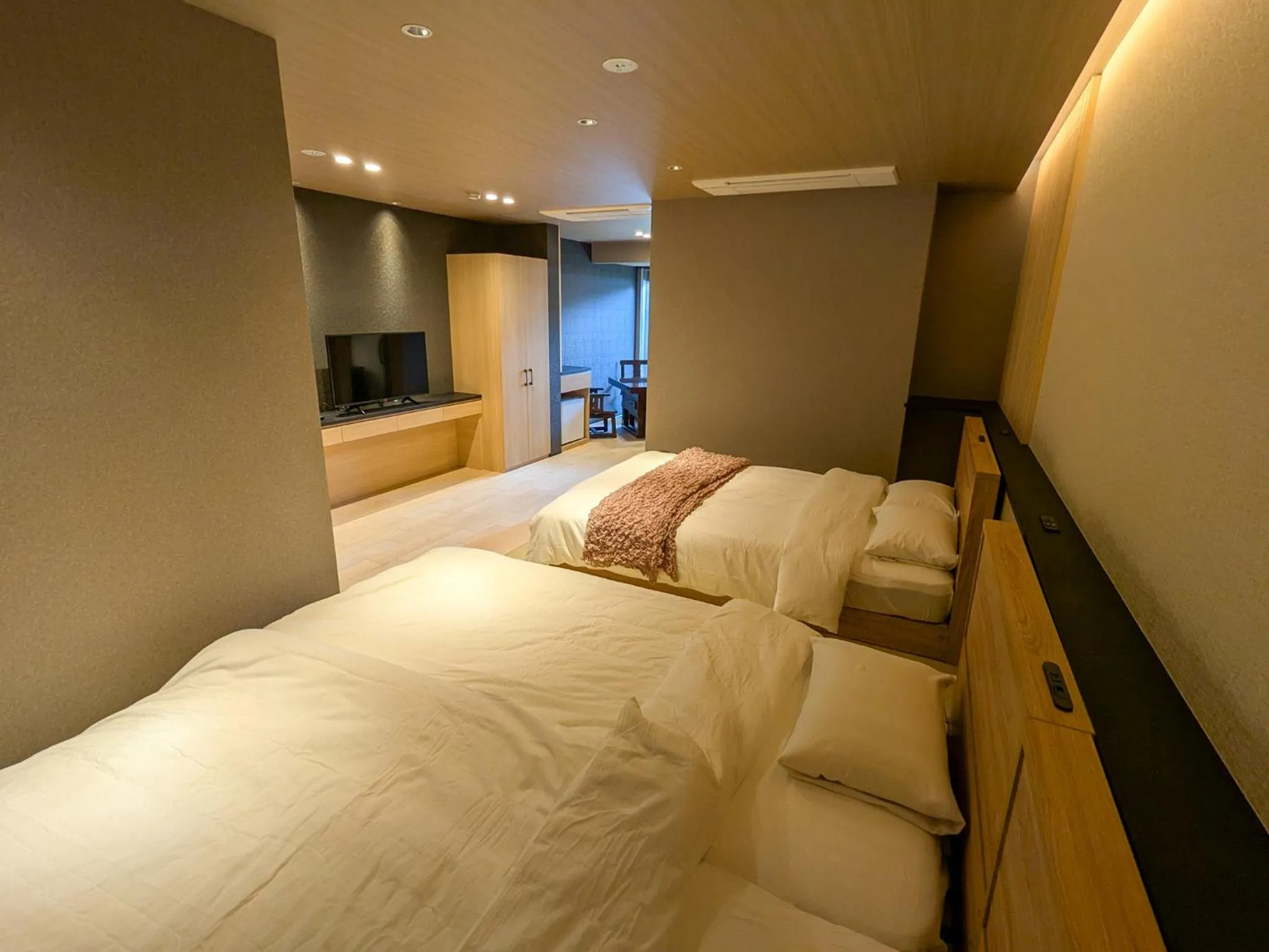 Photo of the whole room, Bed in Tabist Ryokufuen Kiyoharu