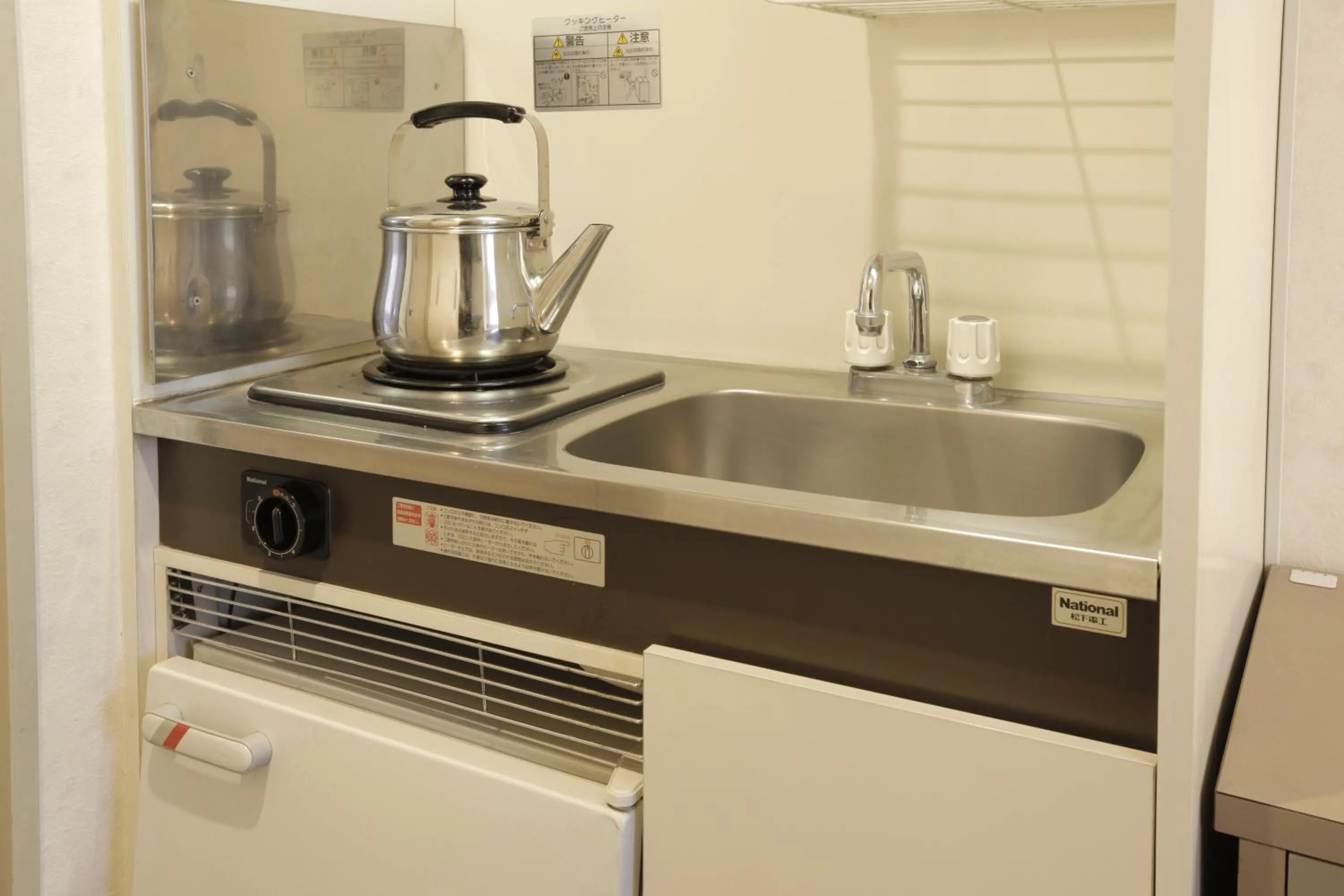 Kitchen or kitchenette in Sankei City Hotel Chiba