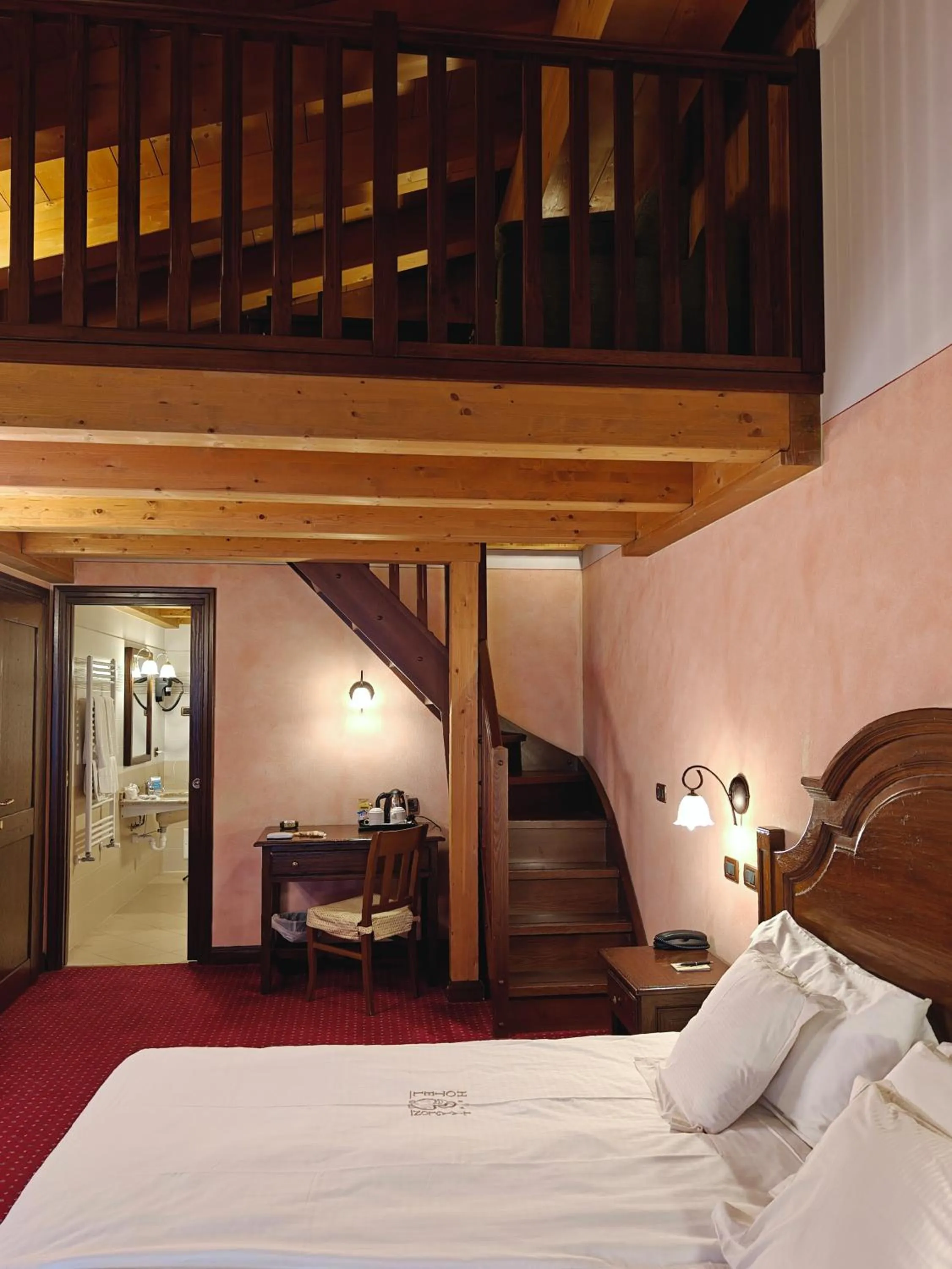 Bed in Hotel L' Aiglon