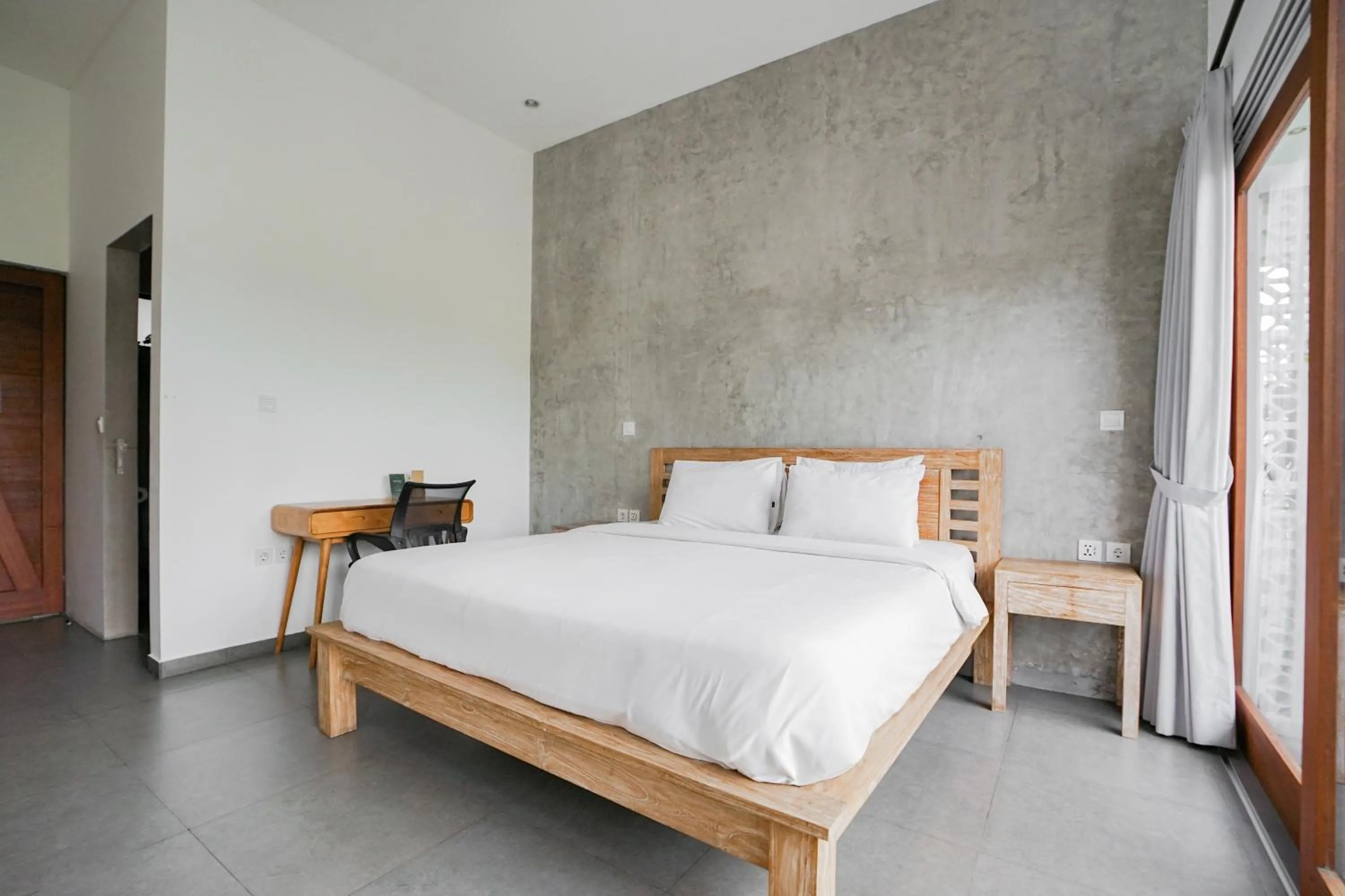 Bed in Suksma Guesthouse