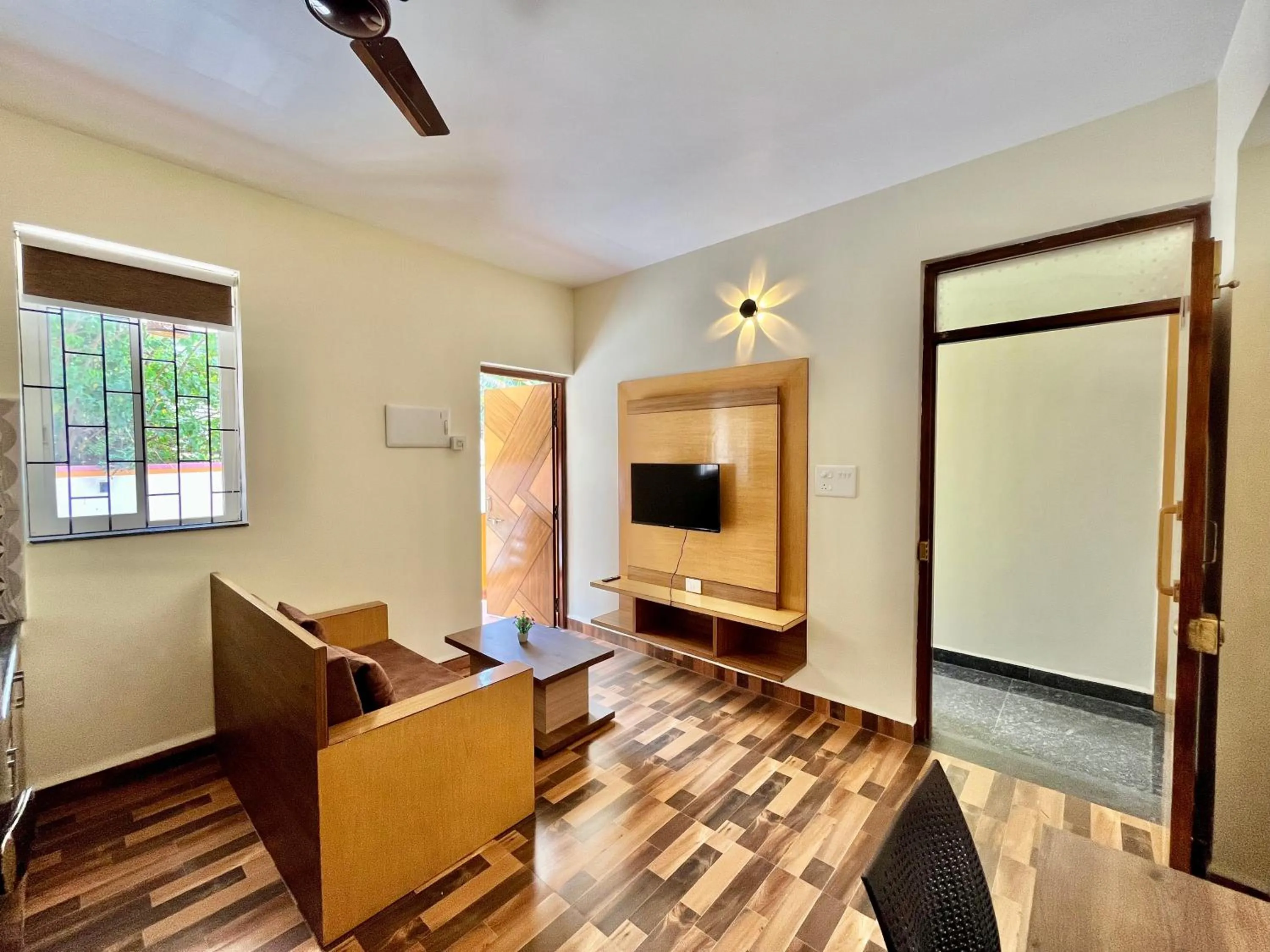 Living room in Lykke Suites- 2-min Drive to Colva Beach-By Goan Felicidade Hospitality PVT LTD
