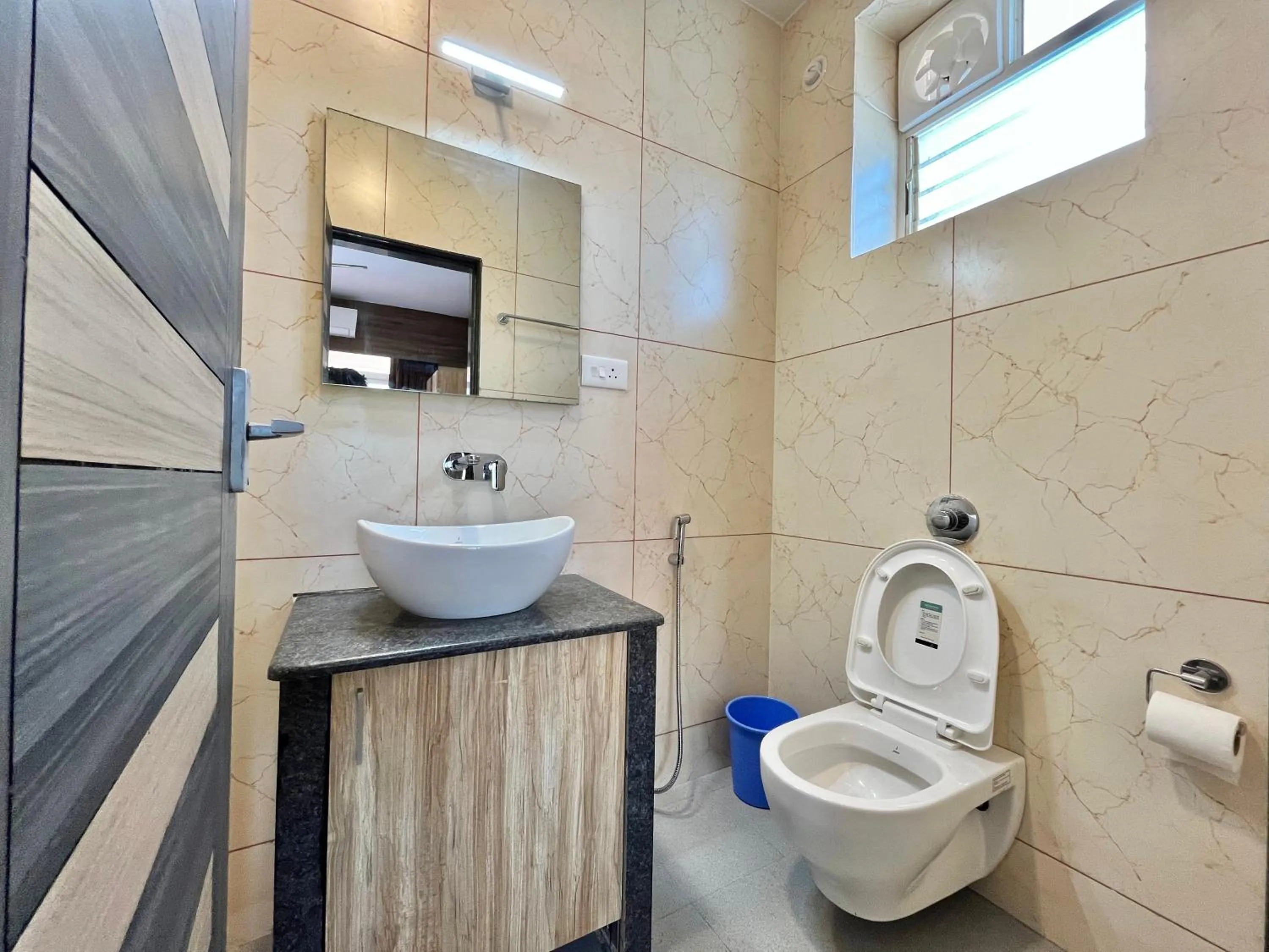 Toilet in Lykke Suites- 2-min Drive to Colva Beach-By Goan Felicidade Hospitality PVT LTD