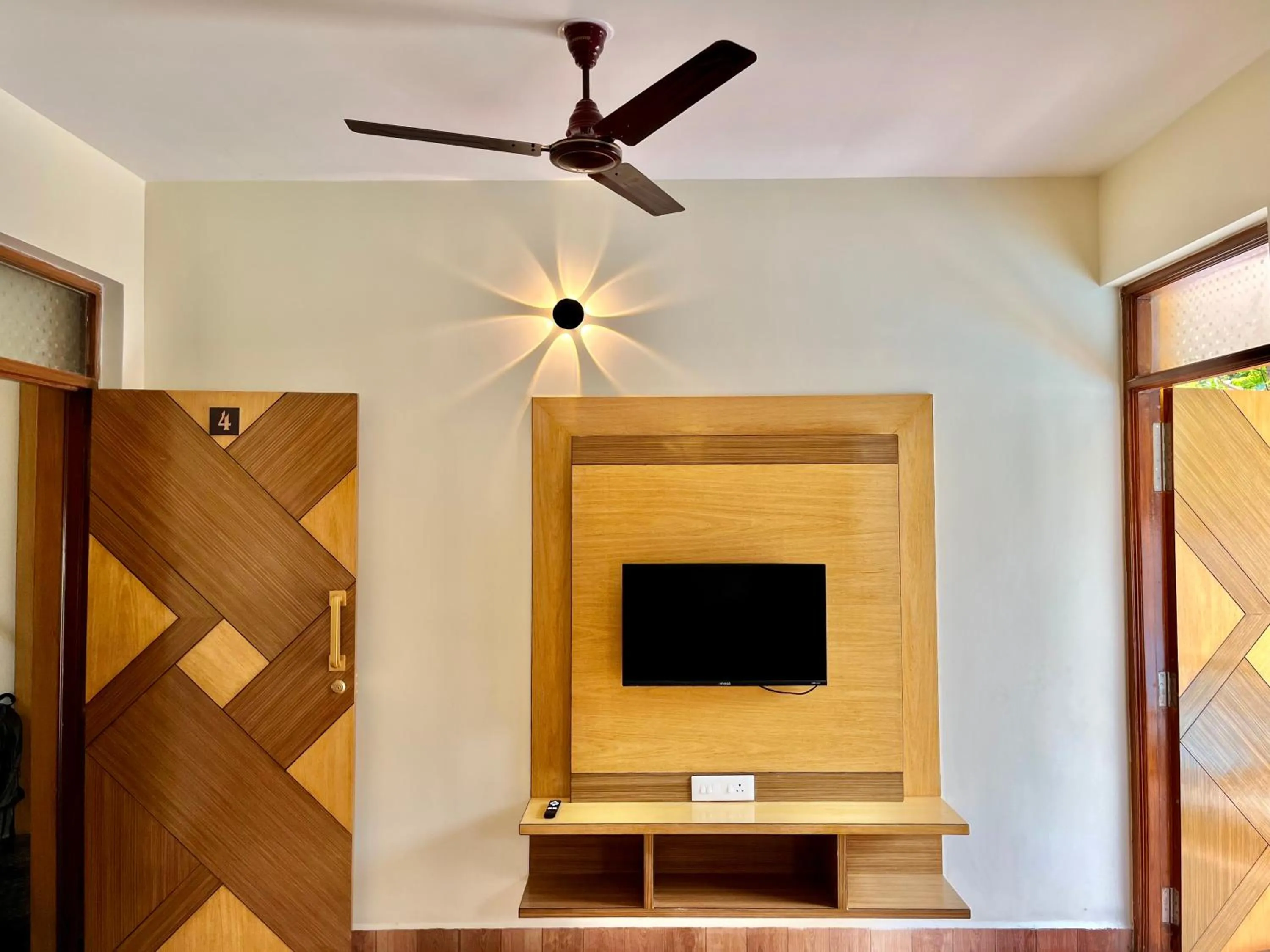TV and multimedia in Lykke Suites- 2-min Drive to Colva Beach-By Goan Felicidade Hospitality PVT LTD
