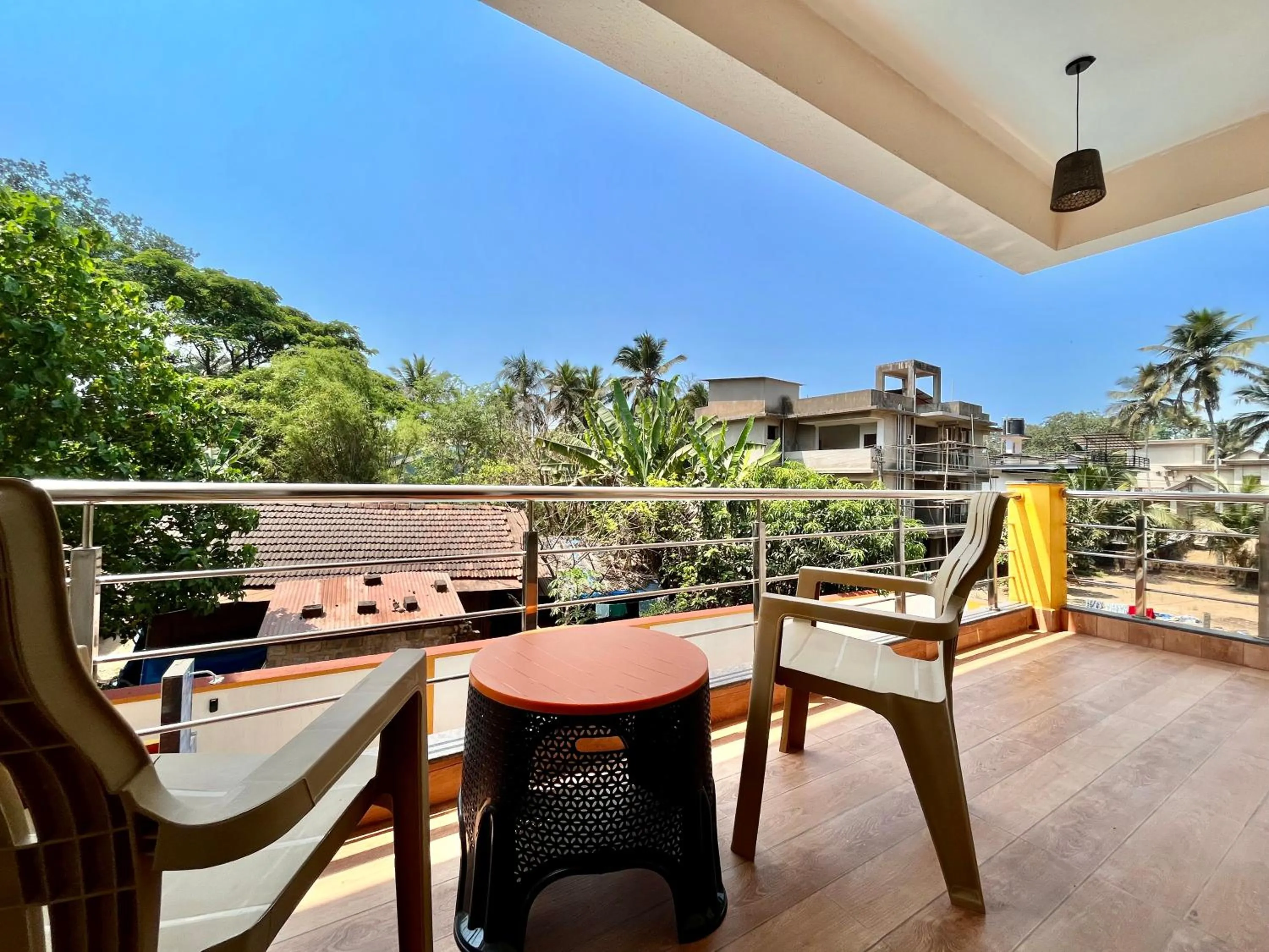 Balcony/Terrace in Lykke Suites- 2-min Drive to Colva Beach-By Goan Felicidade Hospitality PVT LTD