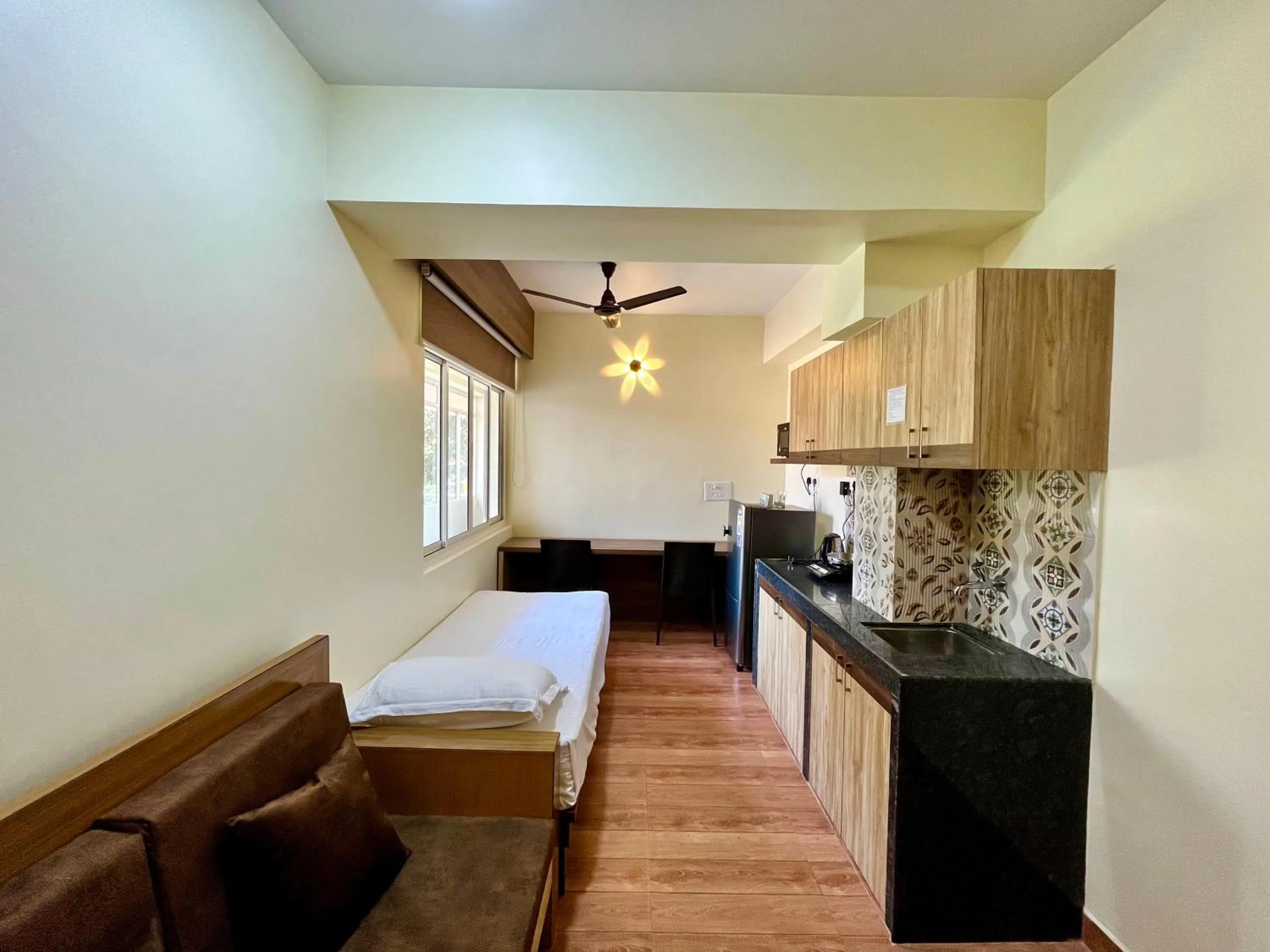 Living room in Lykke Suites- 2-min Drive to Colva Beach-By Goan Felicidade Hospitality PVT LTD