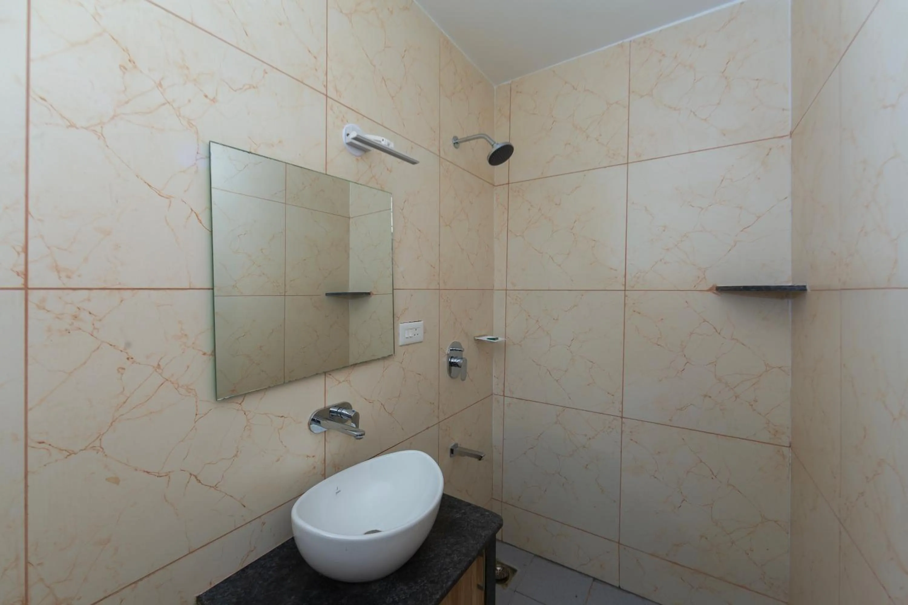 Toilet in Lykke Suites- 2-min Drive to Colva Beach-By Goan Felicidade Hospitality PVT LTD
