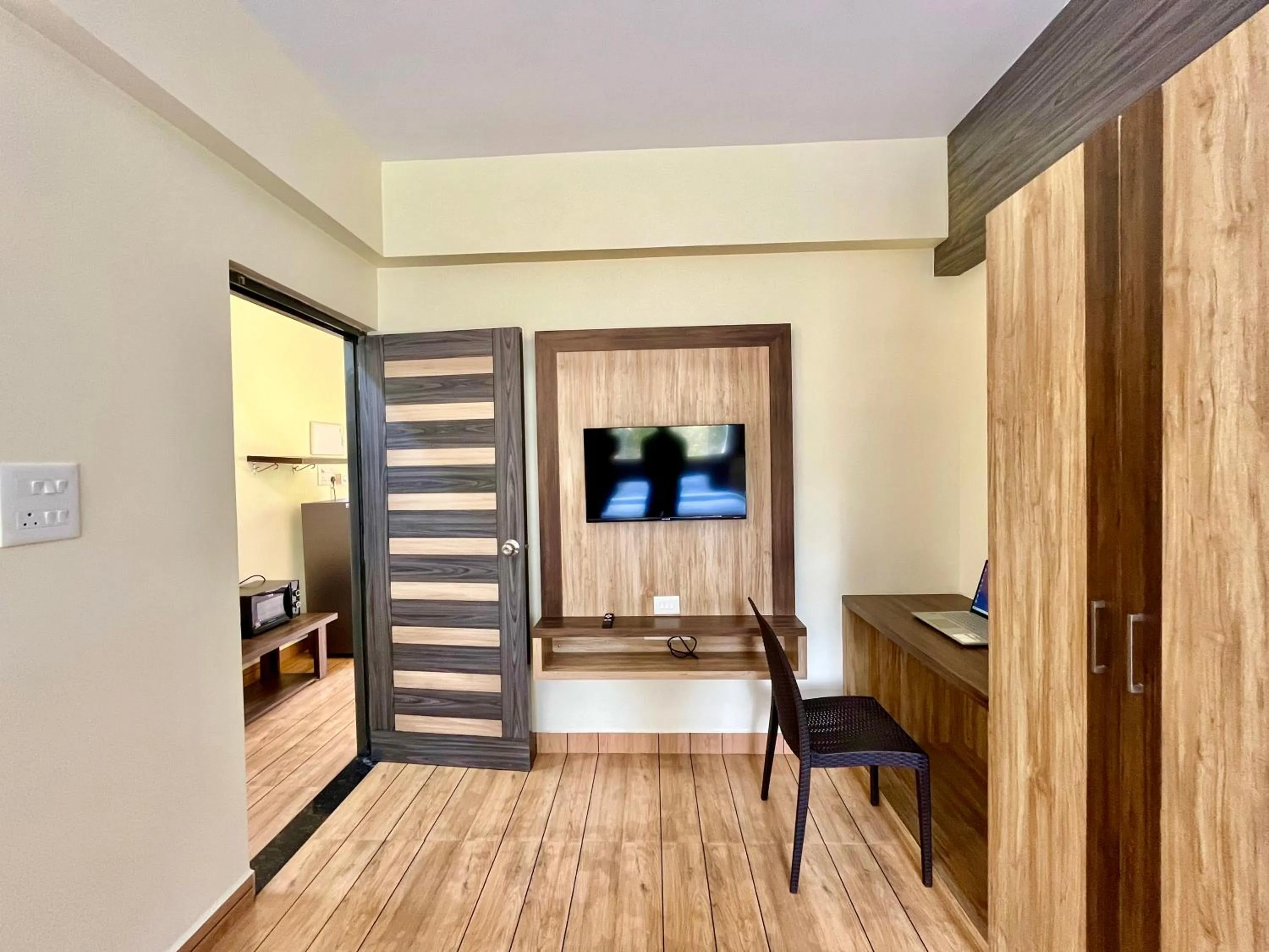 Photo of the whole room in Lykke Suites- 2-min Drive to Colva Beach-By Goan Felicidade Hospitality PVT LTD