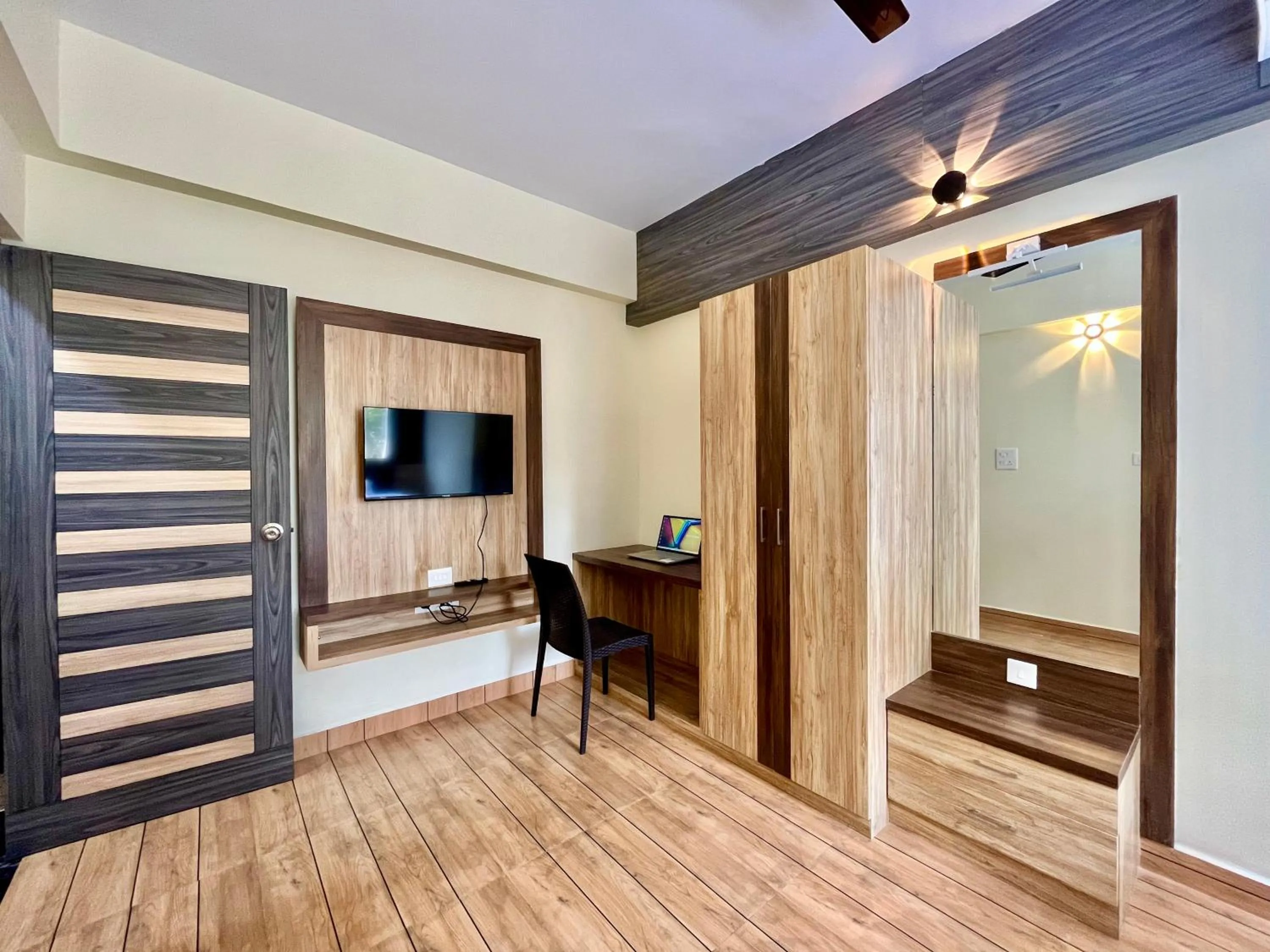 TV and multimedia in Lykke Suites- 2-min Drive to Colva Beach-By Goan Felicidade Hospitality PVT LTD