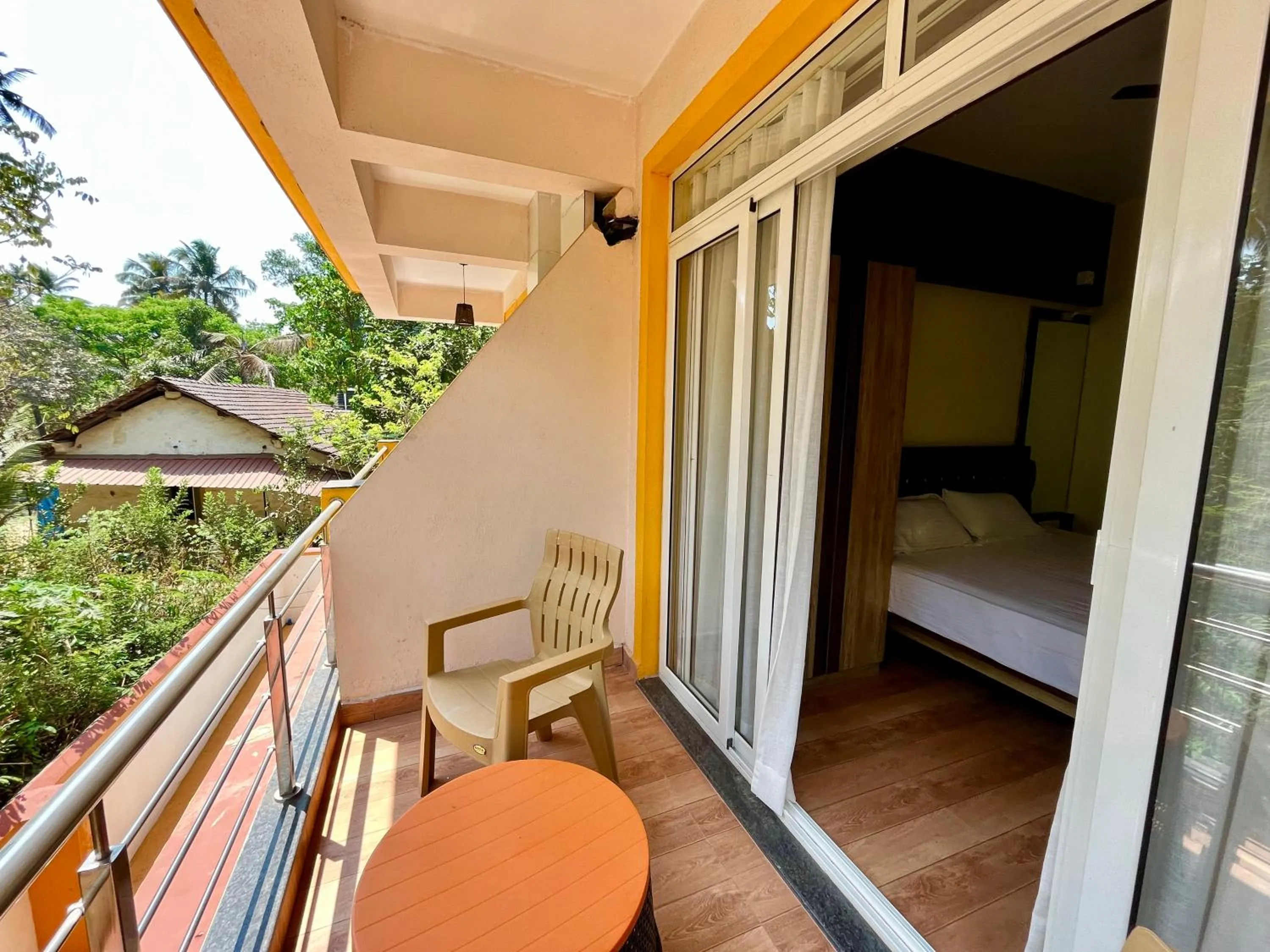 Balcony/Terrace, Bed in Lykke Suites- 2-min Drive to Colva Beach-By Goan Felicidade Hospitality PVT LTD