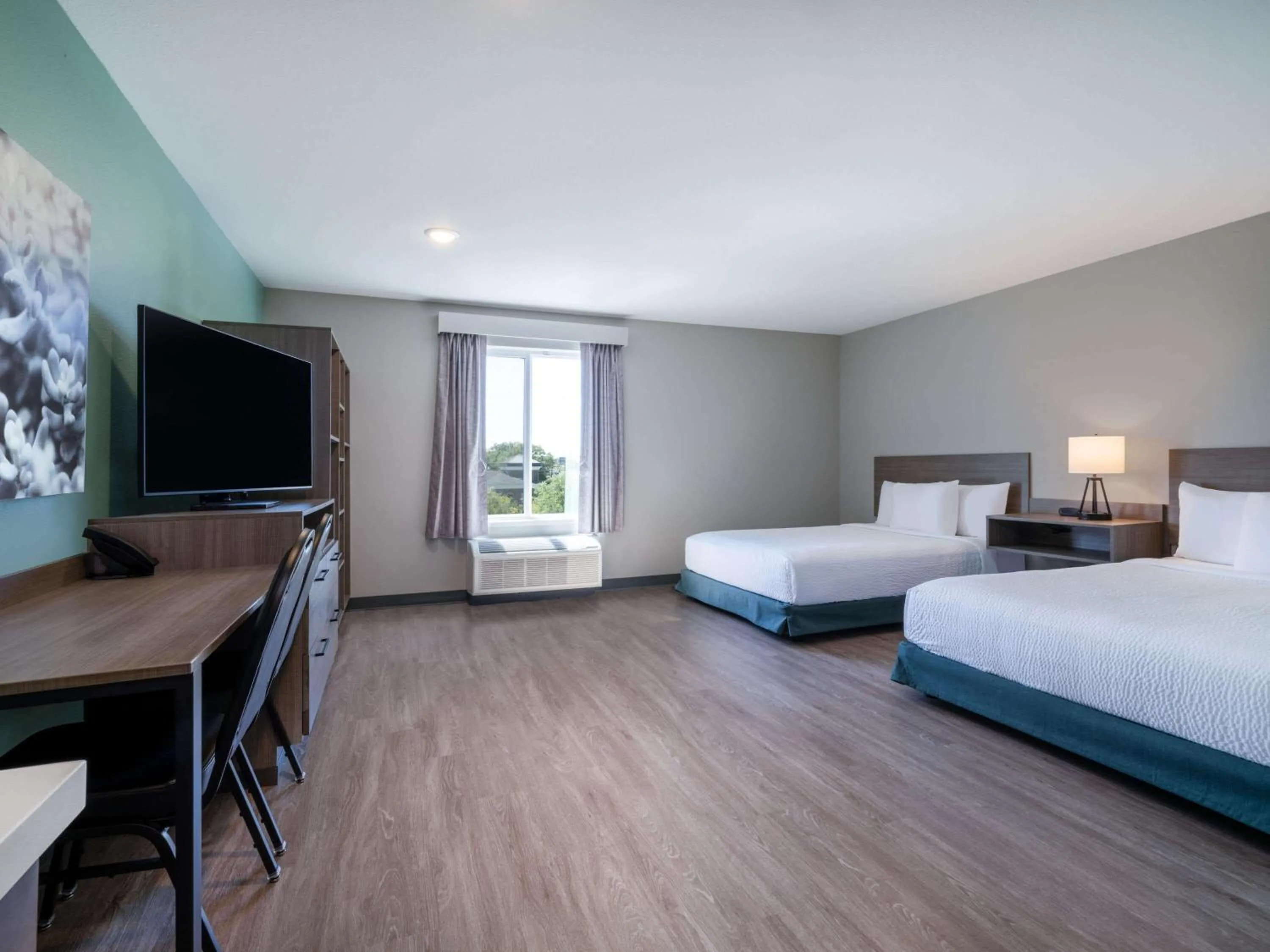 Photo of the whole room, Bed in ECHO Suites Extended Stay by Wyndham Madison