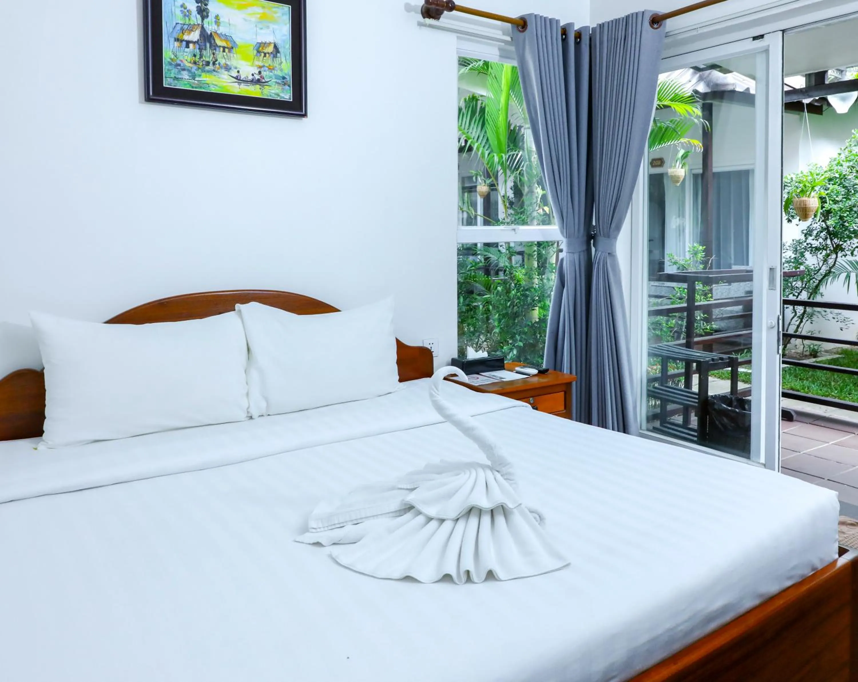 Property building, Bed in Sea Breeze Resort