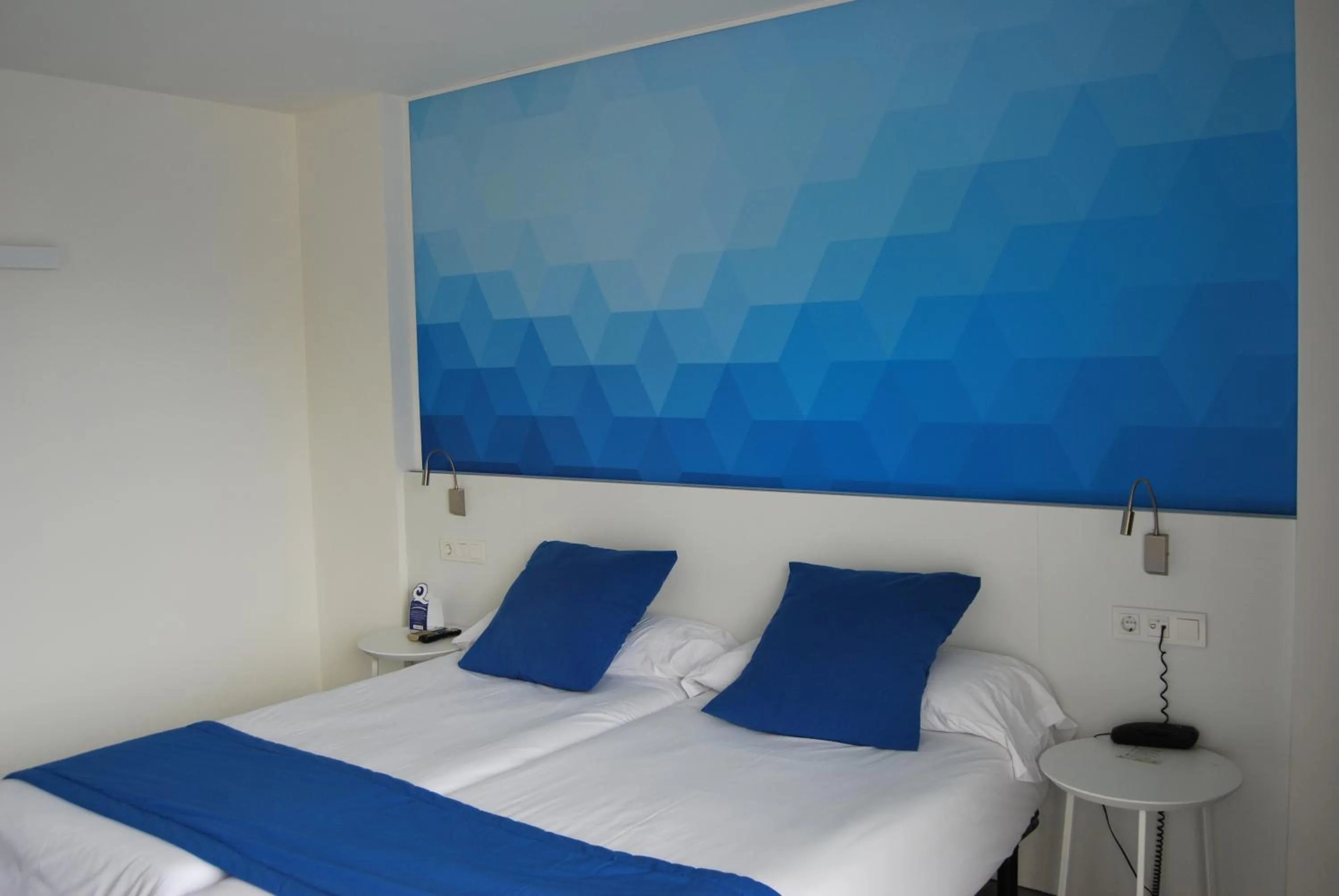 Decorative detail, Bed in Estudiotel Alicante