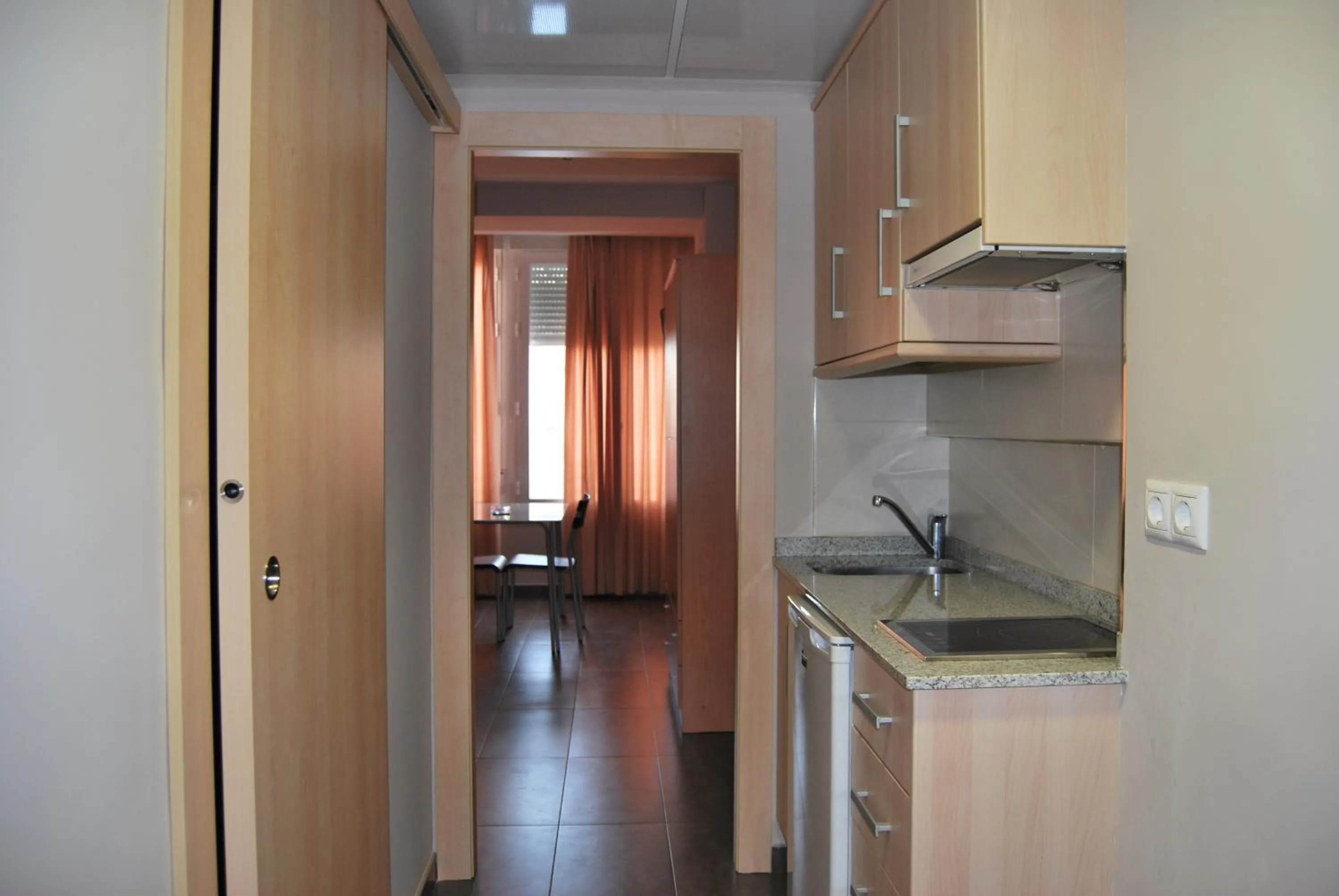 Kitchen or kitchenette in Estudiotel Alicante