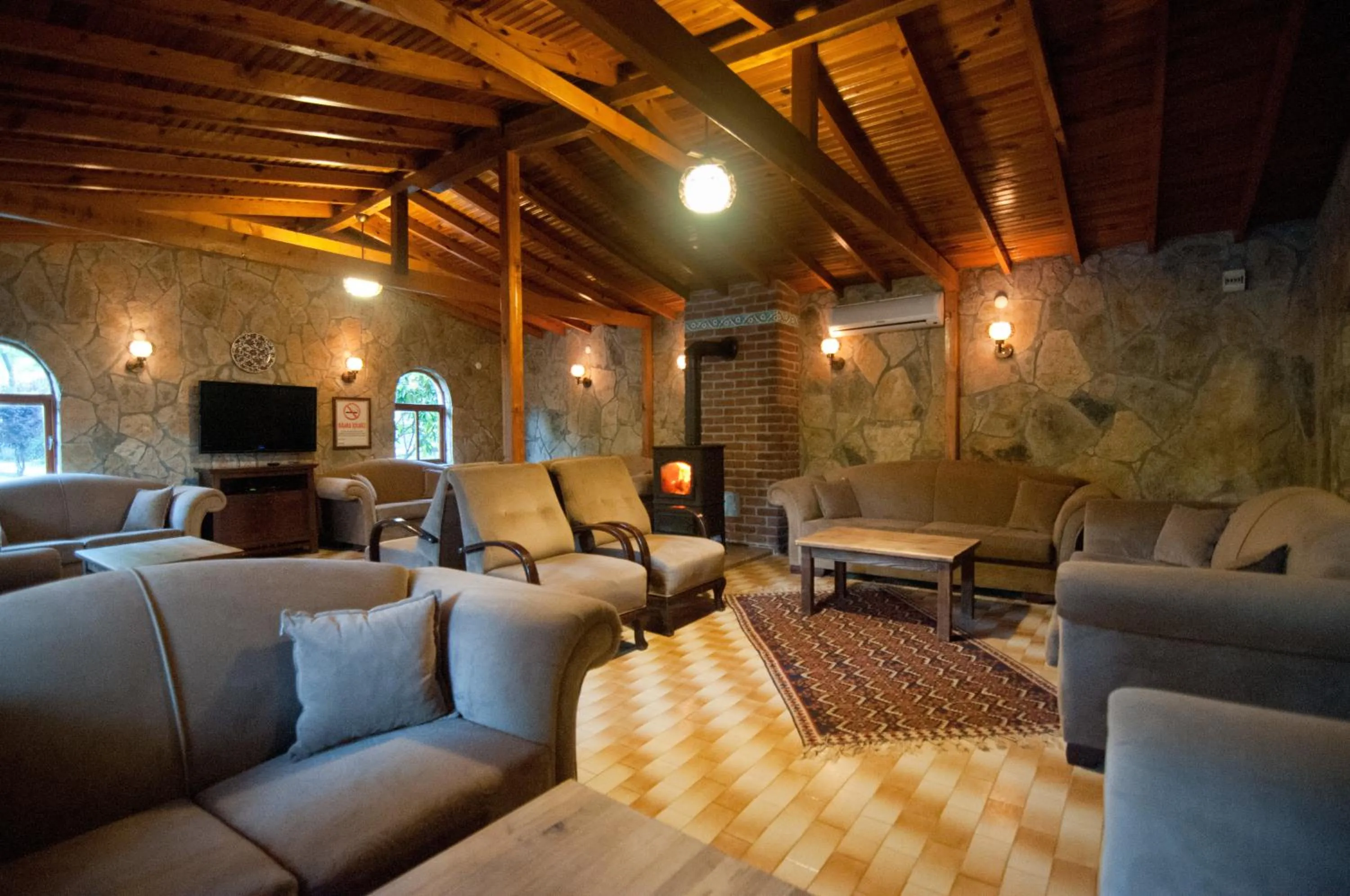 Communal lounge/ TV room in Fener Motel