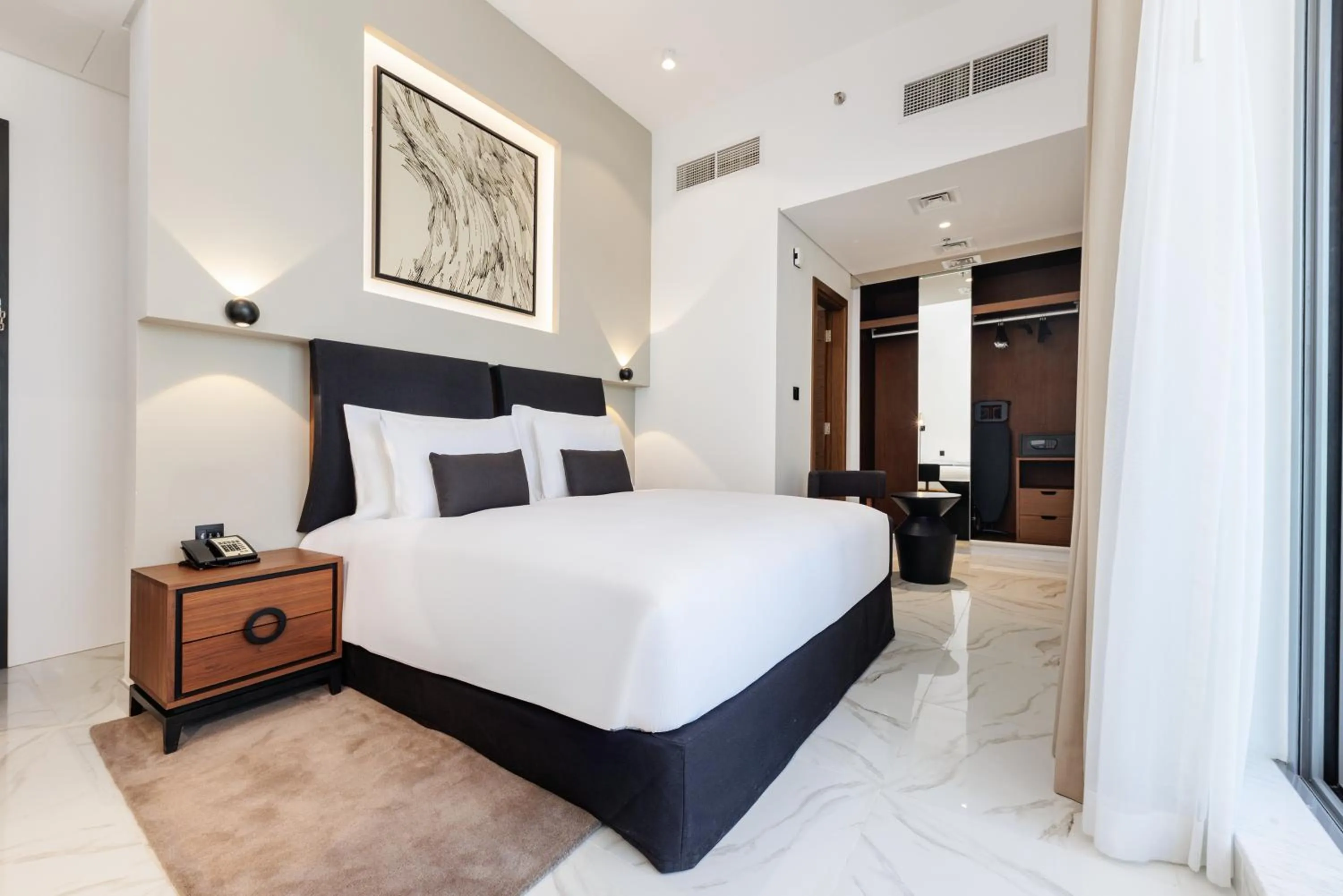 Photo of the whole room, Bed in Holiday Inn Dubai Village Circle by IHG