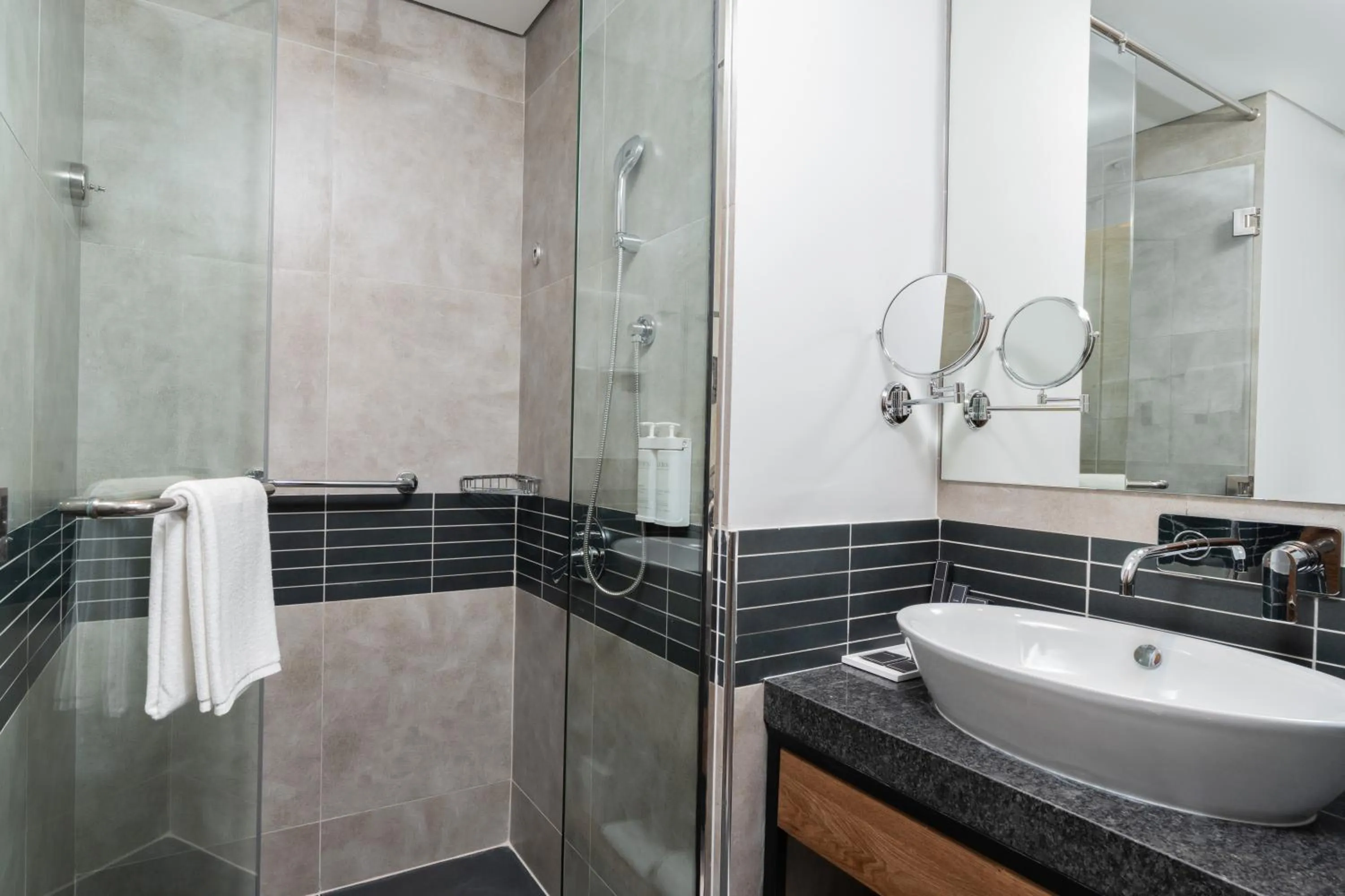 Shower in Holiday Inn Dubai Village Circle by IHG