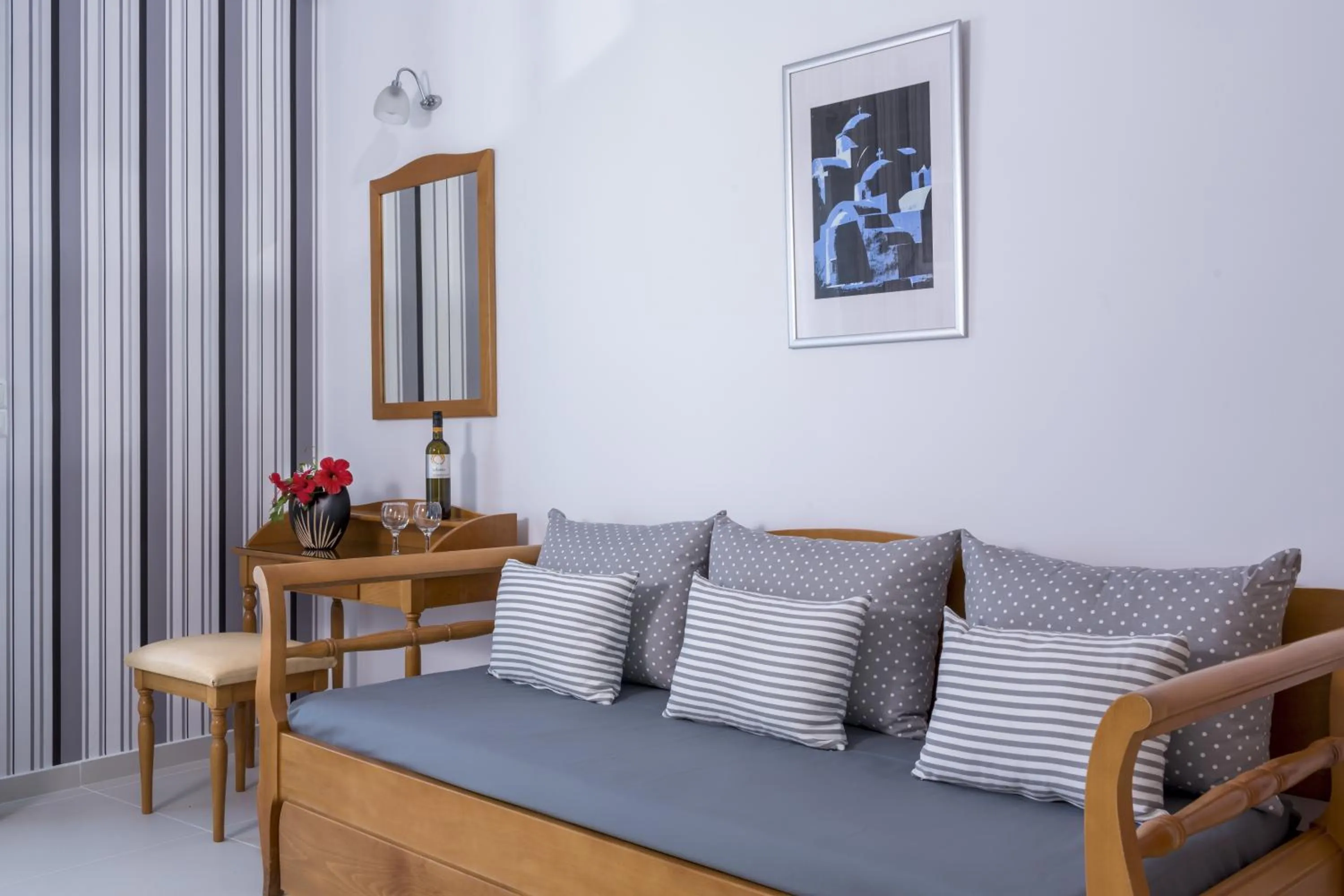 Seating area, Bed in Santellini Hotel