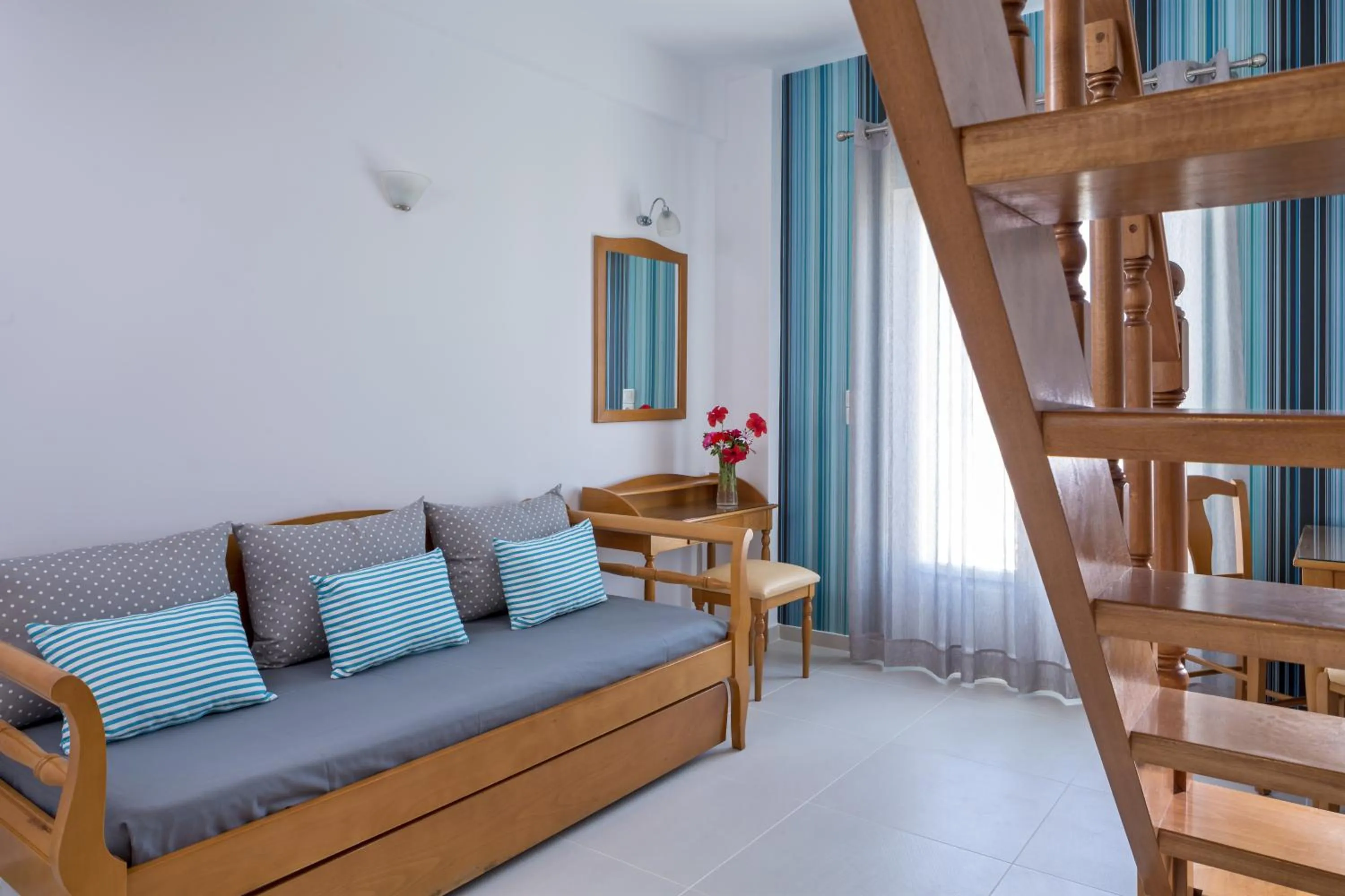Seating area, Bed in Santellini Hotel