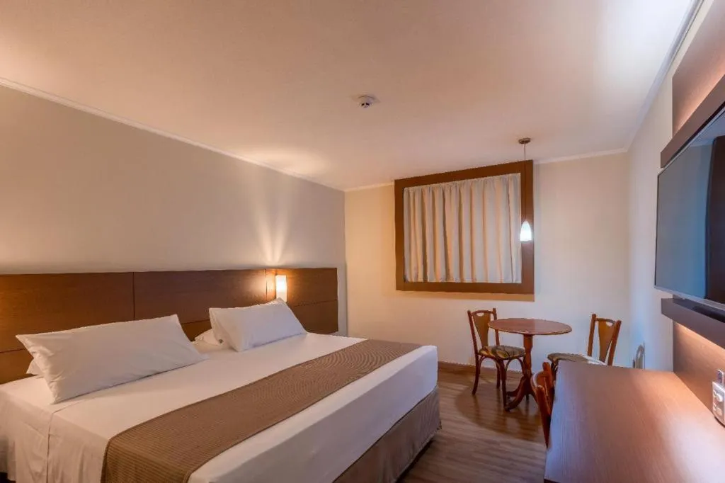 Bed in Hotel Caiuá Cascavel