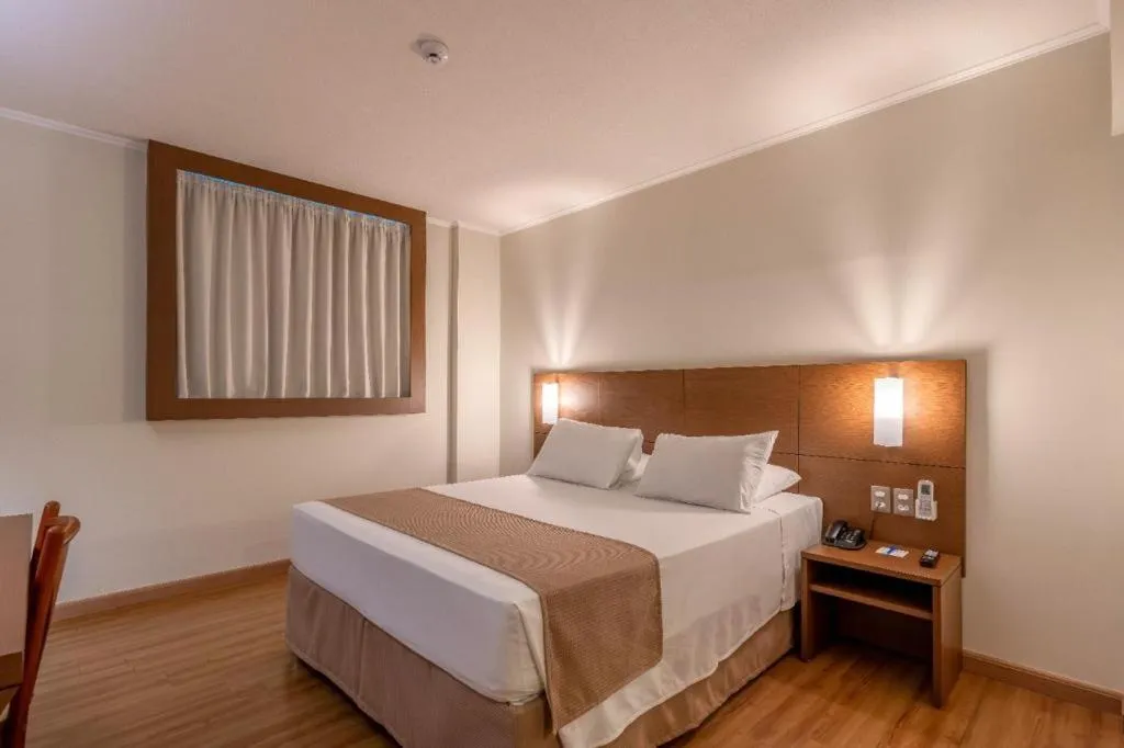 Bed in Hotel Caiuá Cascavel