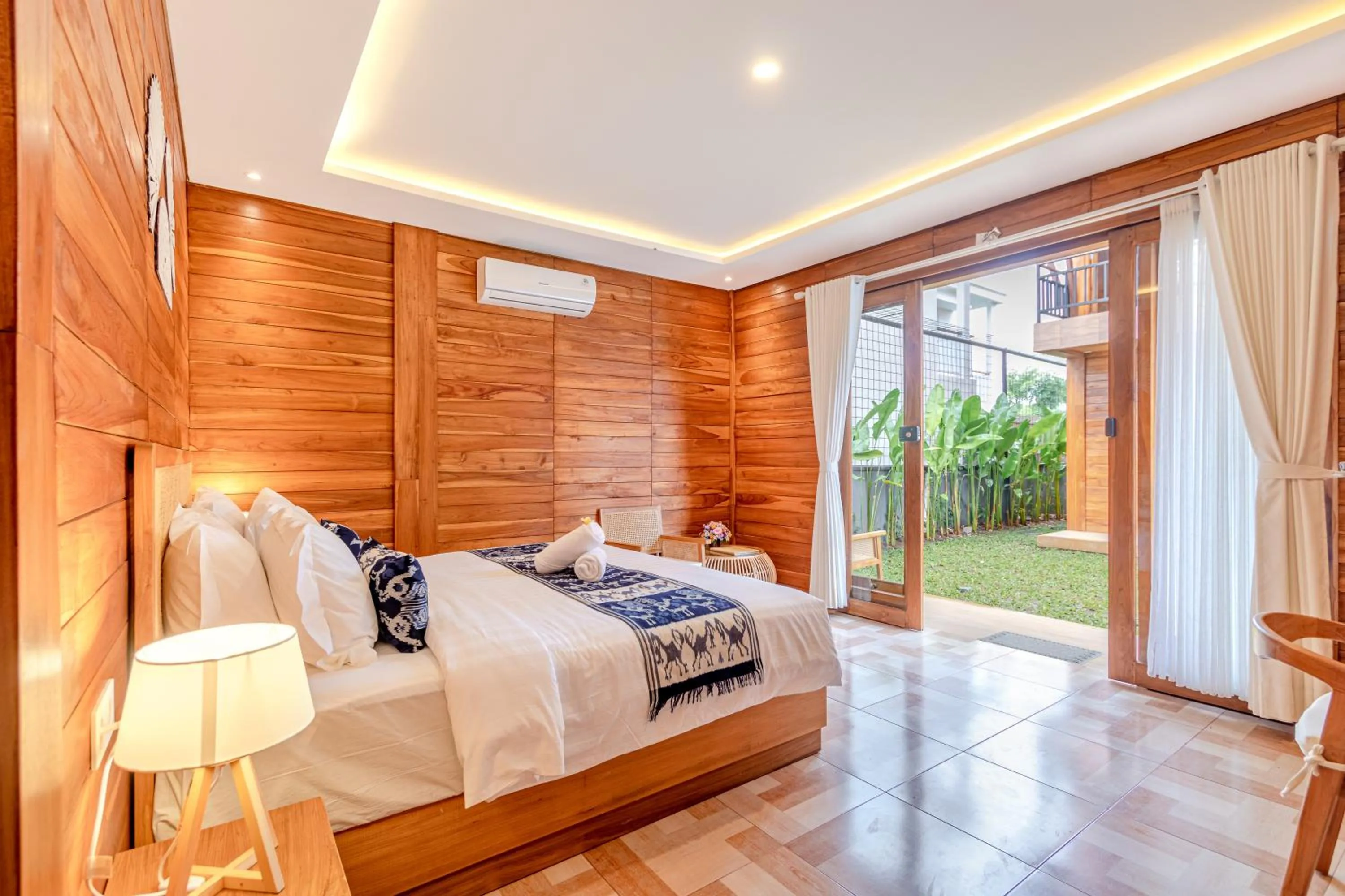 Bed in Anartha Resort Jimbaran By Kubu GWK