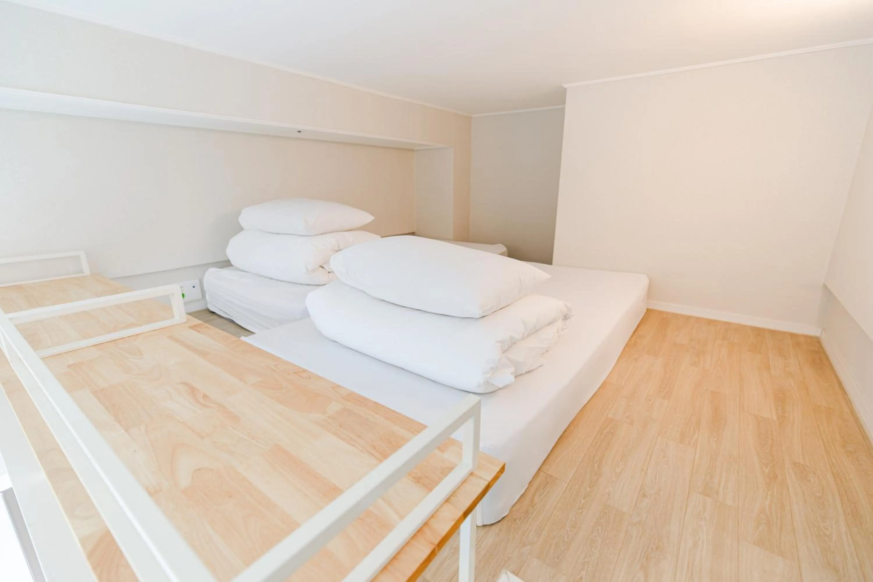 Bed in Blue Ocean Hotel 3