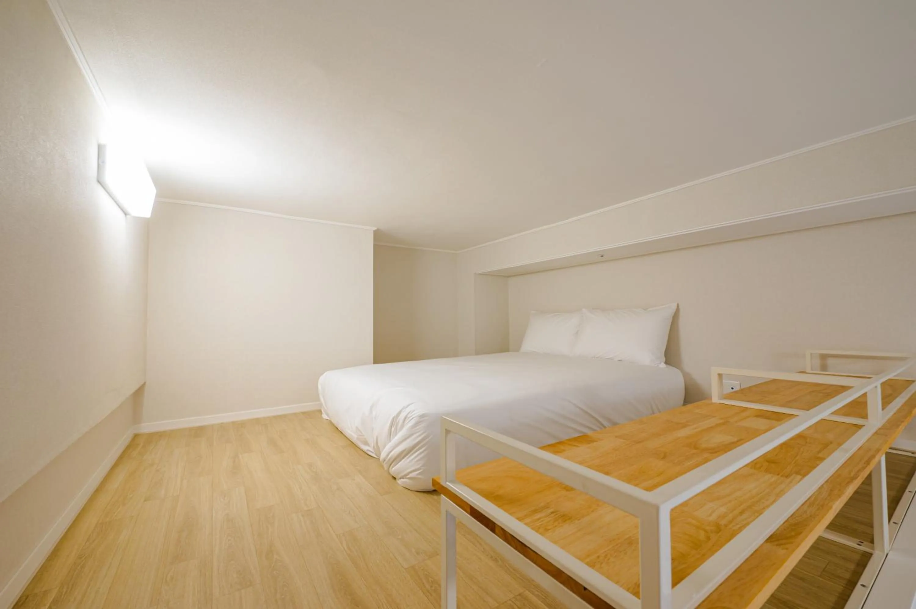 Bed in Blue Ocean Hotel 3