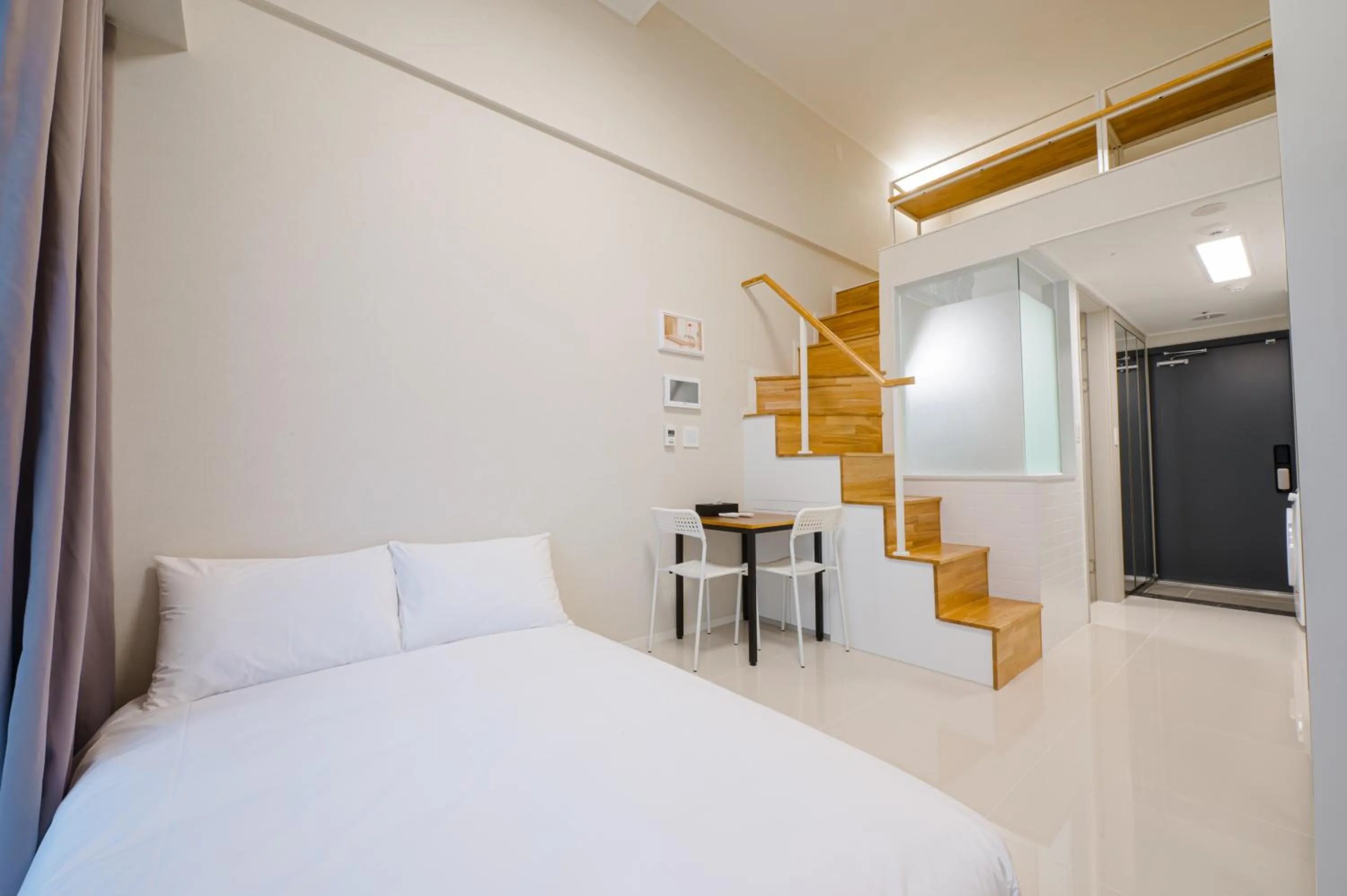 Bed in Blue Ocean Hotel 3