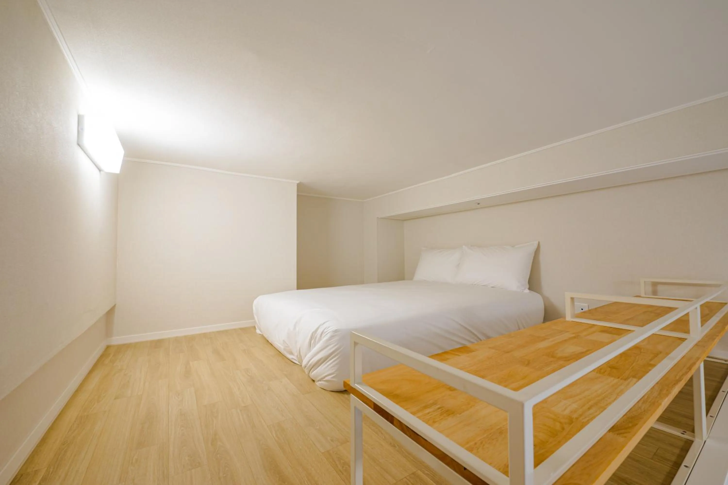 Bed in Blue Ocean Hotel 3