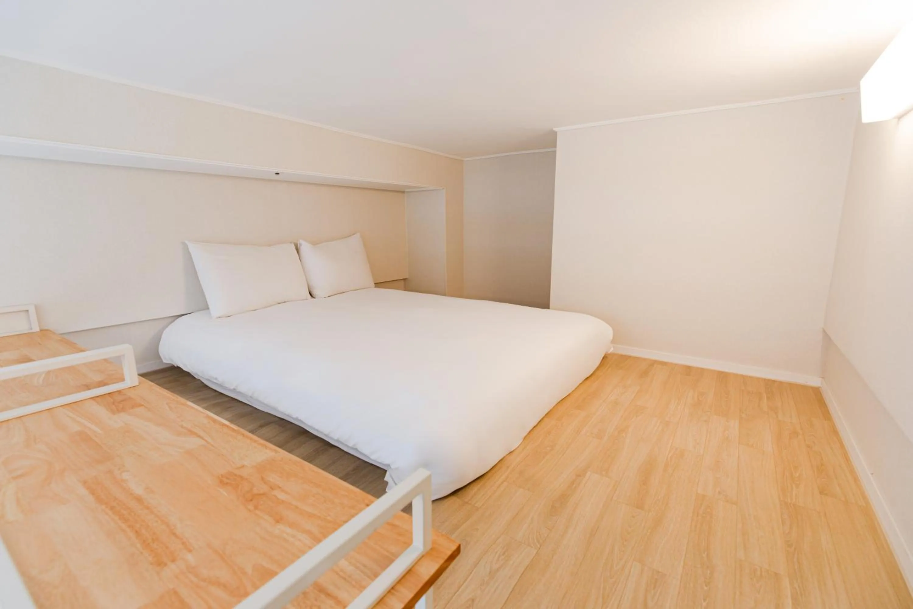 Bed in Blue Ocean Hotel 3