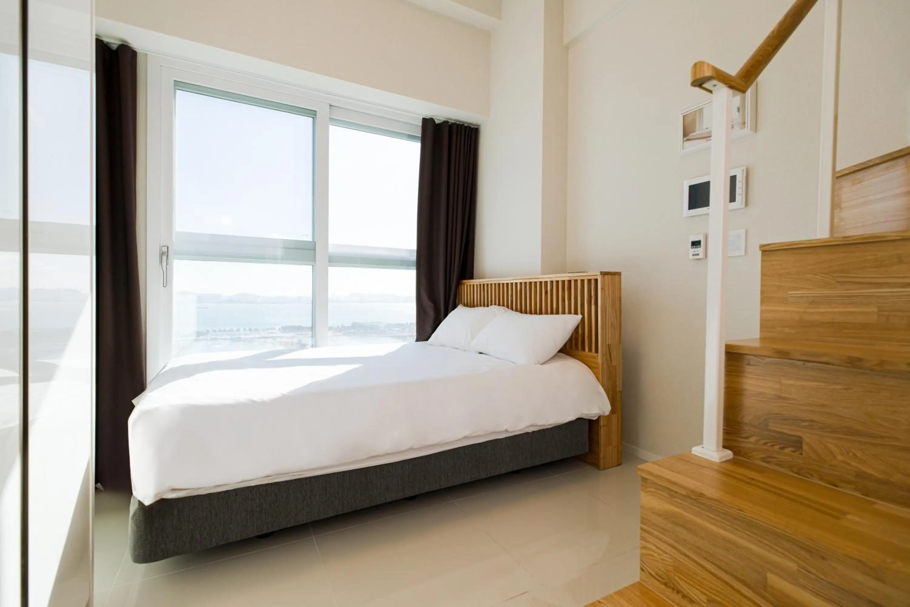 Bed in Blue Ocean Hotel 3