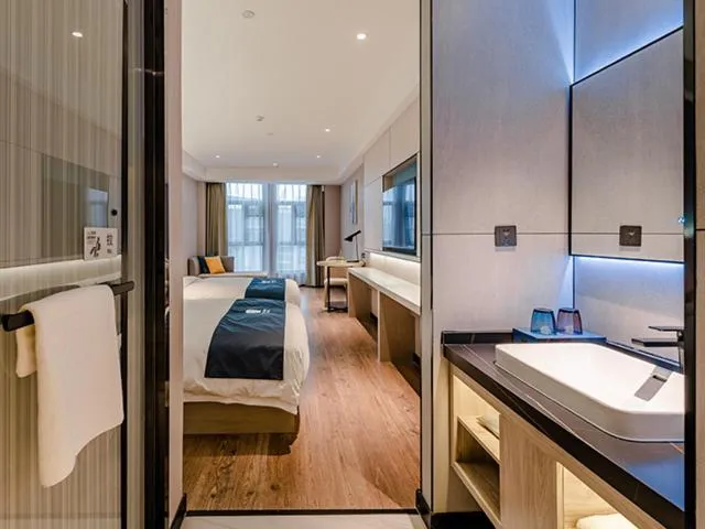 Bed in Echarm Hotel Yunmeng Mengze Lake Branch